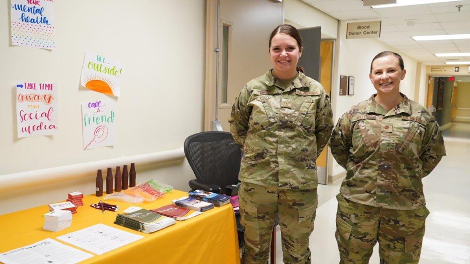 Senior Airman Natalie Lapar (left), a Wright-Patterson Medical Center mental health technician, and Maj. Elizabeth Belleau, 88th Healthcare Operations Squadron clinical psychologist, worked the mental health booth Oct. 7 during Women’s Wellness Day at the Women’s Health Clinic. The informational booth was set up to offer women guidance and literature on living a mentally healthy lifestyle. U.S. AIR FORCE PHOTO/KENNETH STILES