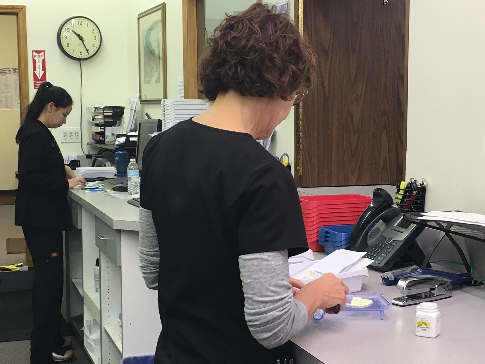 Staff work to fill prescriptions at Waynesville Pharmacy. KATIE WEDELL/STAFF