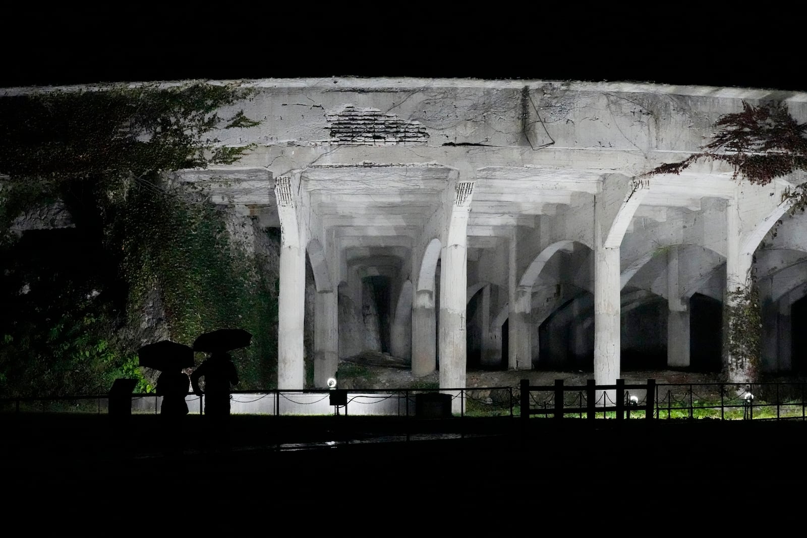 One of the industrial heritages Kitazawa Flotation Plant, a processing gold ore plant, is illuminated in Sado, Niigata prefecture, Japan, Saturday, Nov. 23, 2024. (AP Photo/Eugene Hoshiko)