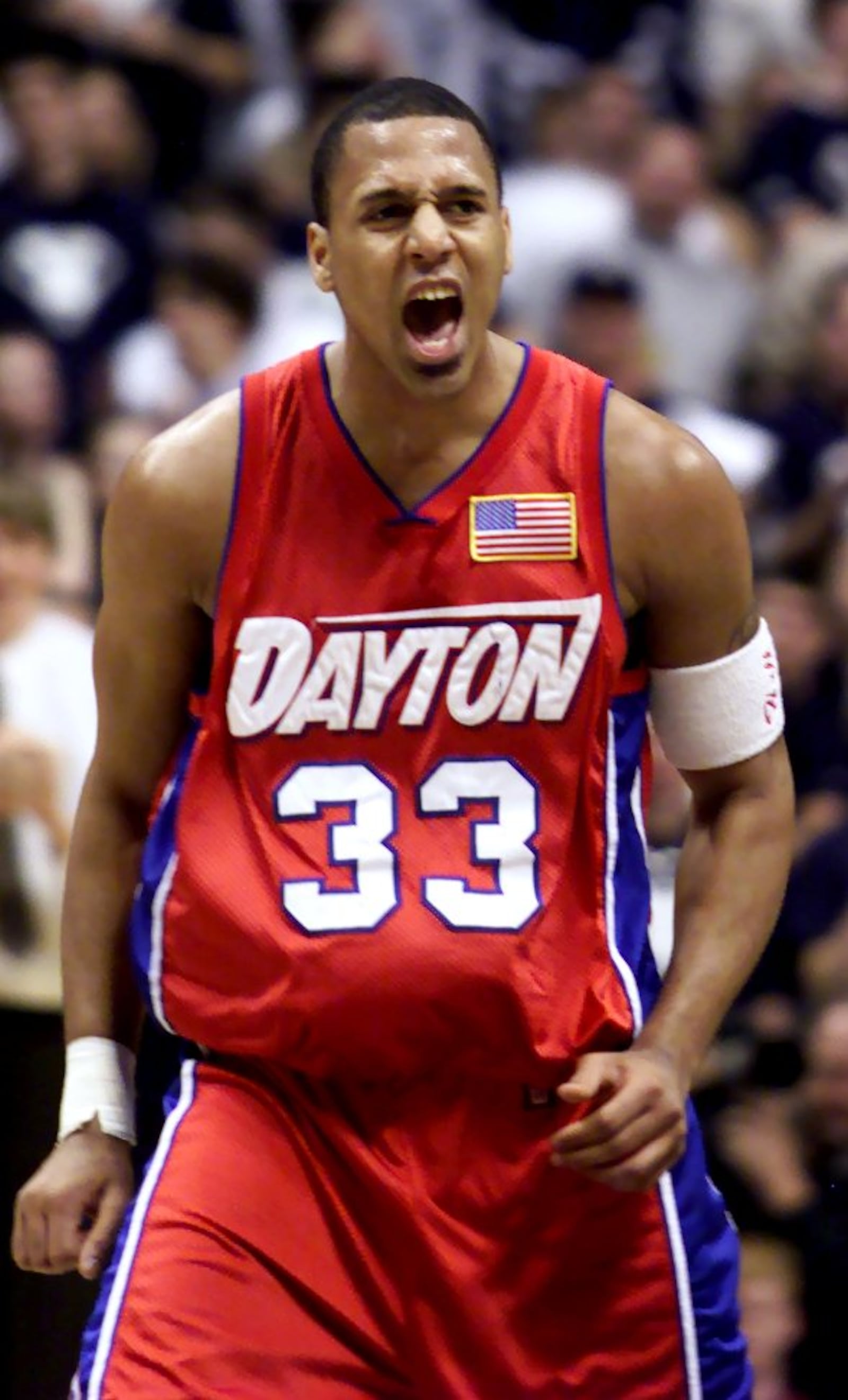 Brooks Hall celebrates widening Dayton's lead after he scored two points in the first half. UD eventually lost to Xavier by a score of 85 to 77. The game was played at Xavier's Cintas Center.