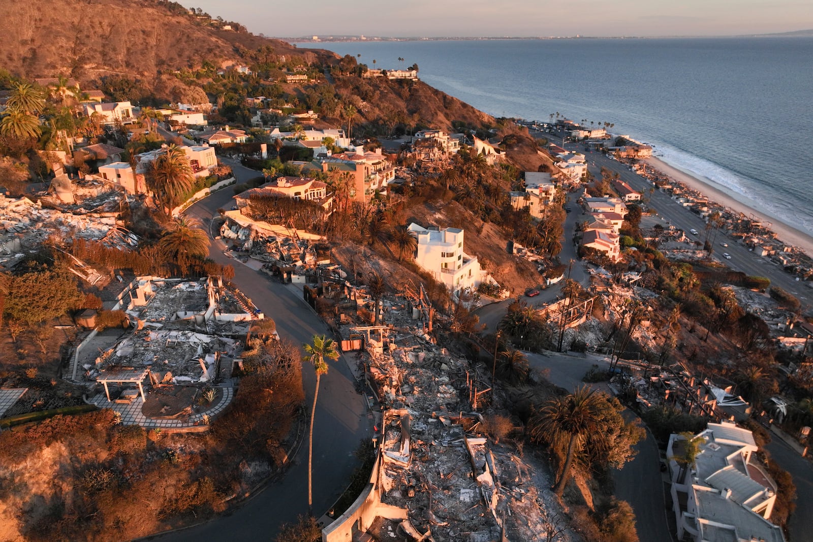 FILE - An aerial view shows the devastation by the Palisades Fire Thursday, Jan. 16, 2025 in Malibu, Calif. (AP Photo/Jae C. Hong, File)