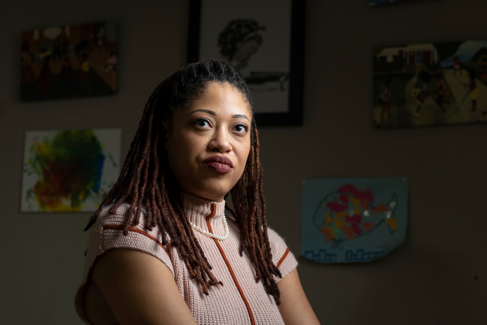 Natasha Nelson, who was diagnosed with autism in August 2023, just after her youngest daughter was also diagnosed, sits in a sensory room she uses to calm her children in her Stone Mountain, Ga. home on Friday, Feb. 14, 2025. (AP Photo/Ben Gray)