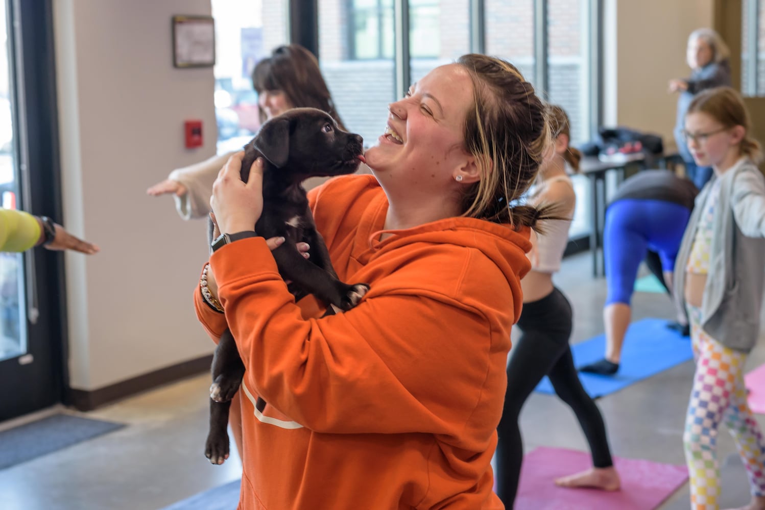 PHOTOS: Puppy Yoga at SICSA Pet Adoption and Wellness Center