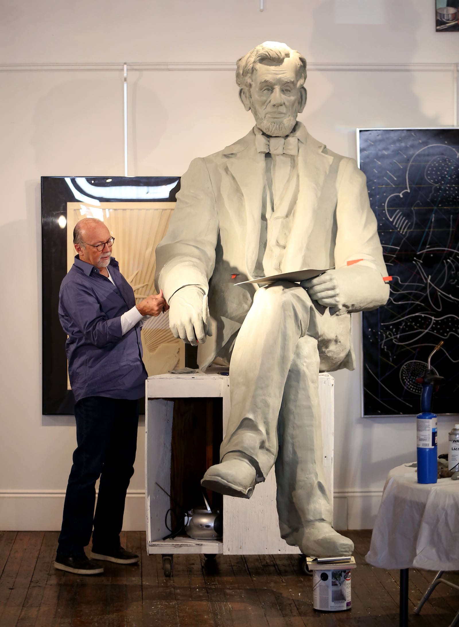 Artist Mike Major has created a sculpture of Abraham Lincoln at his studio in Urbana. The statue will be dedicated on the Dayton VA Medical Center campus on Memorial Day weekend.  LISA POWELL / STAFF