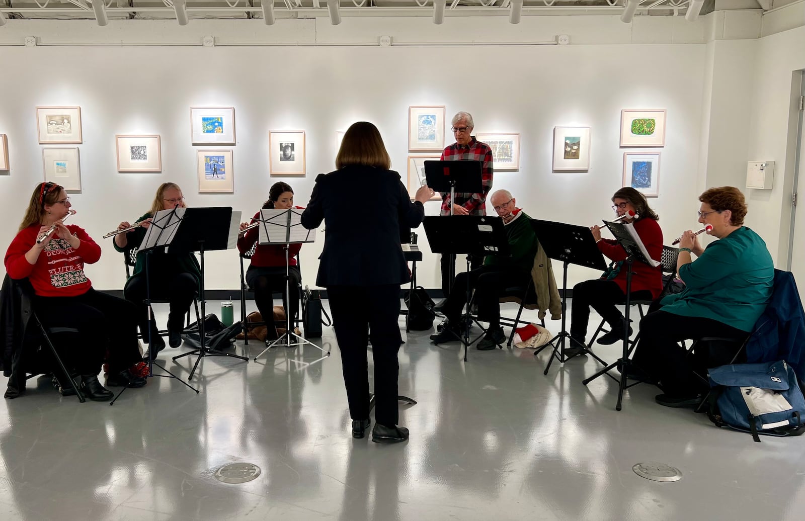 Flutists played music in the Rosewood Arts Centre gallery on Saturday, Dec. 2, 2023. AIMEE HANCOCK/STAFF