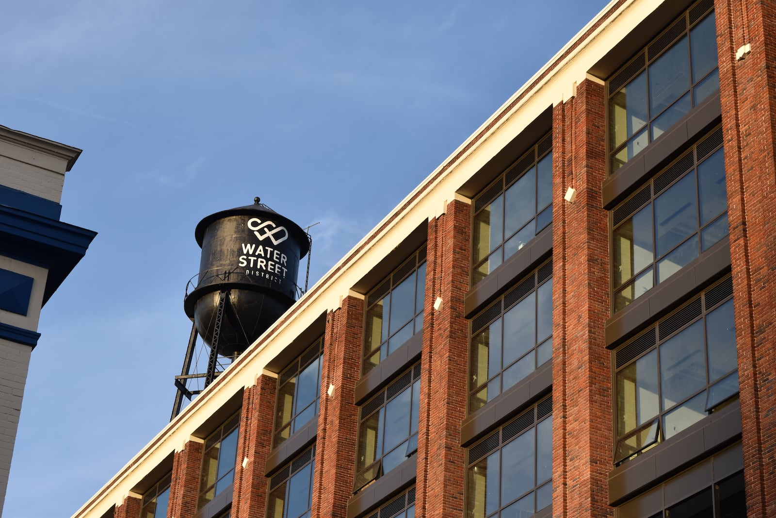 The water tower on the rooftop of the Delco, which is the former Mendelsons liquidation outlet near Day Air Ballpark in downtown Dayton. That northeastern part of downtown has been renamed the Water Street District. CORNELIUS FROLIK / STAFF