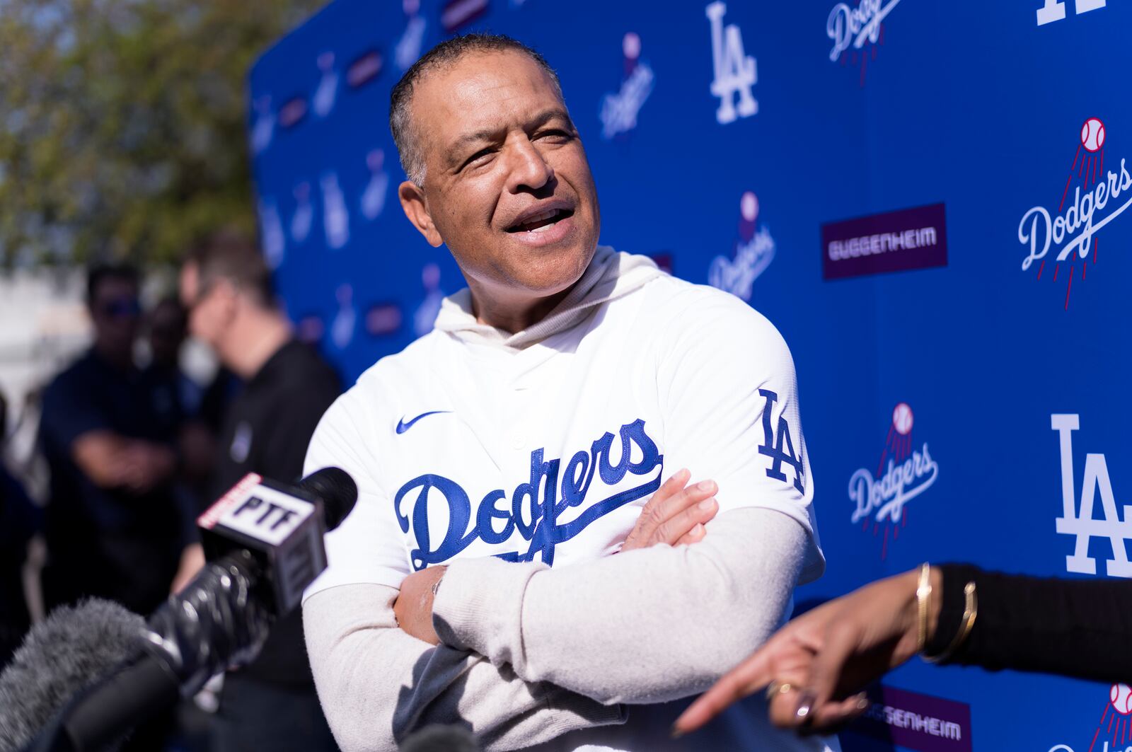 Los Angeles Dodgers baseball manager Dave Roberts talks to the media during an interview at the DodgerFest event at Dodger Stadium, Saturday, Feb. 1, 2025 in Los Angeles. (AP Photo/Richard Vogel)