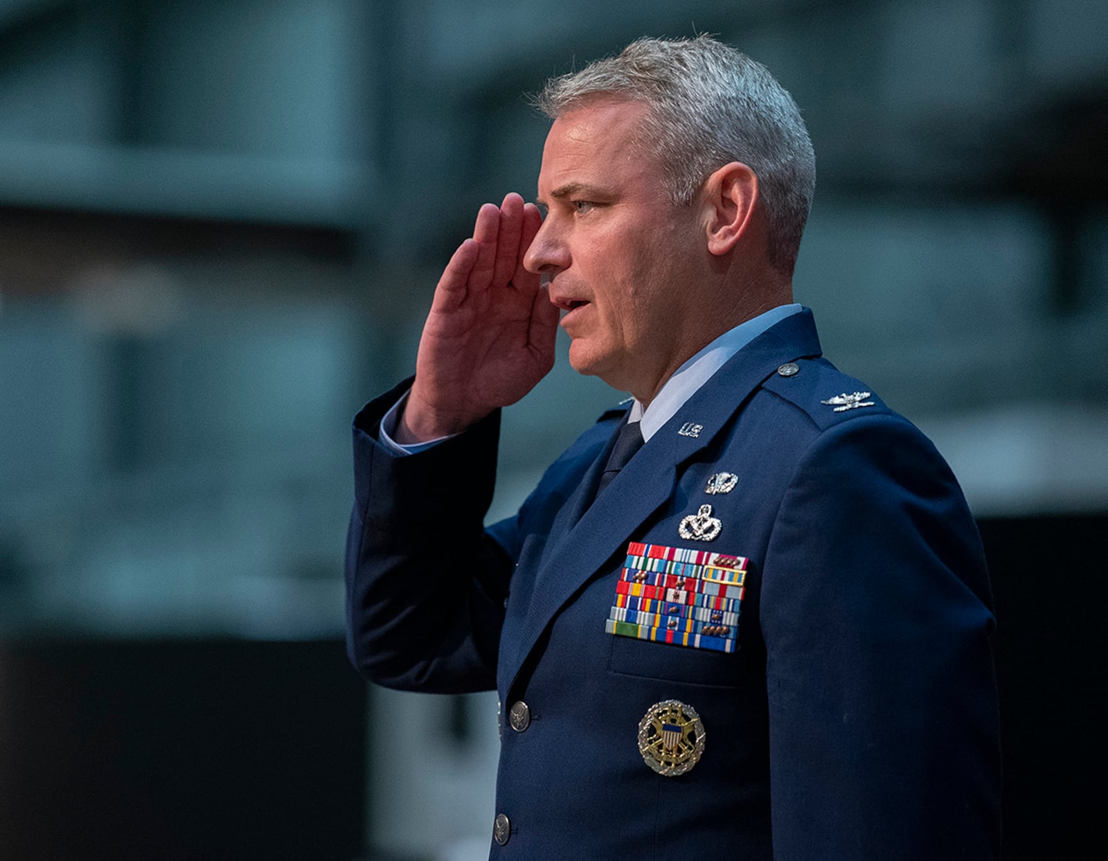 Col. Christopher Meeker returns his first salute as 88th Air Base Wing and installation commander during a change of command ceremony July 7 inside the National Museum of the U.S. Air Force. U.S. AIR FORCE PHOTO/R.J. ORIEZ