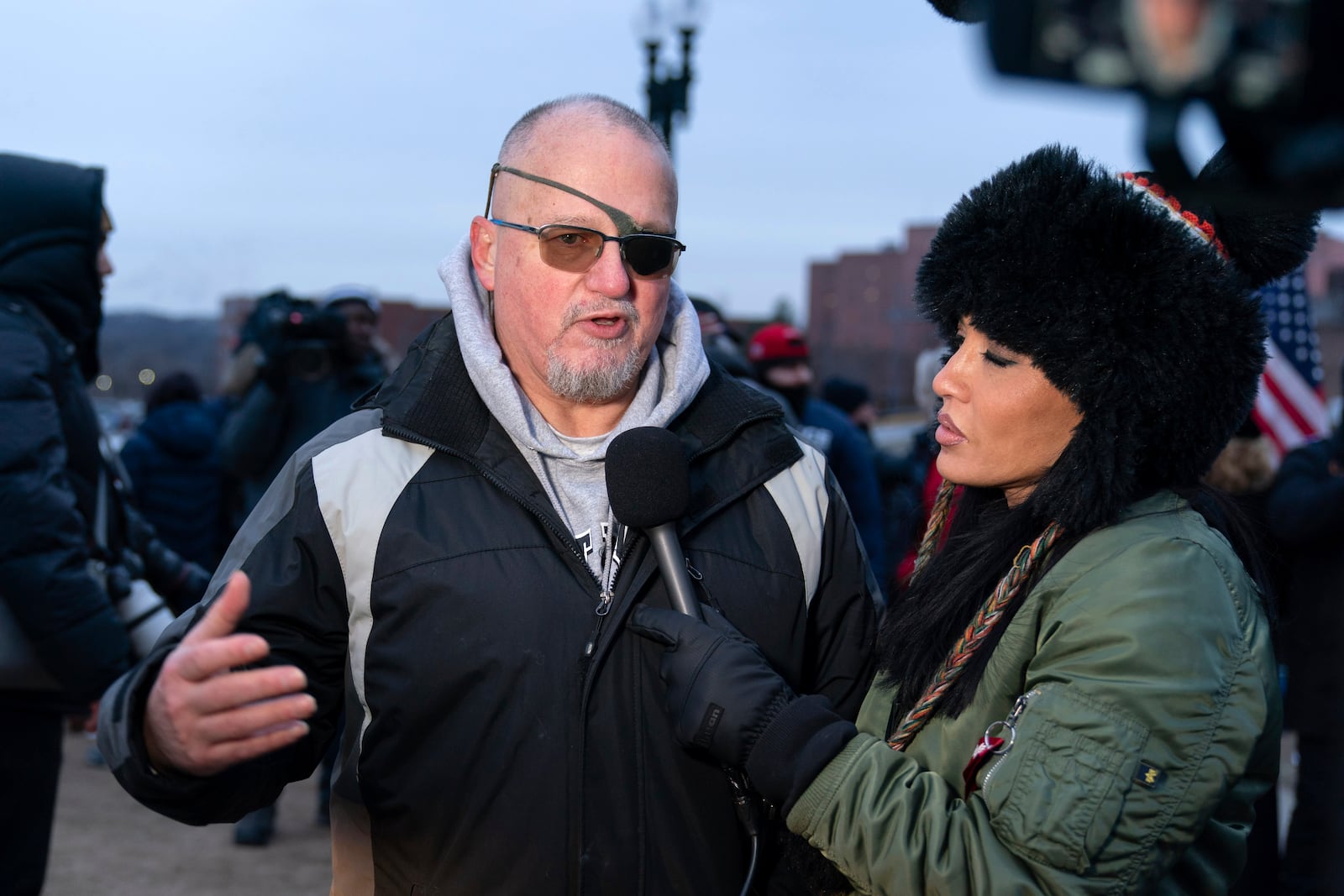 President Donald Trump supporter Oath Keepers founder Stewart Rhodes convicted on charges relating to the Jan. 6 riot at the U.S. Capitol, talks to reporters outside the DC Central Detention Facility, after being released from a jail in Maryland, in Washington, Tuesday, Jan. 21, 2025. (AP Photo/Jose Luis Magana)