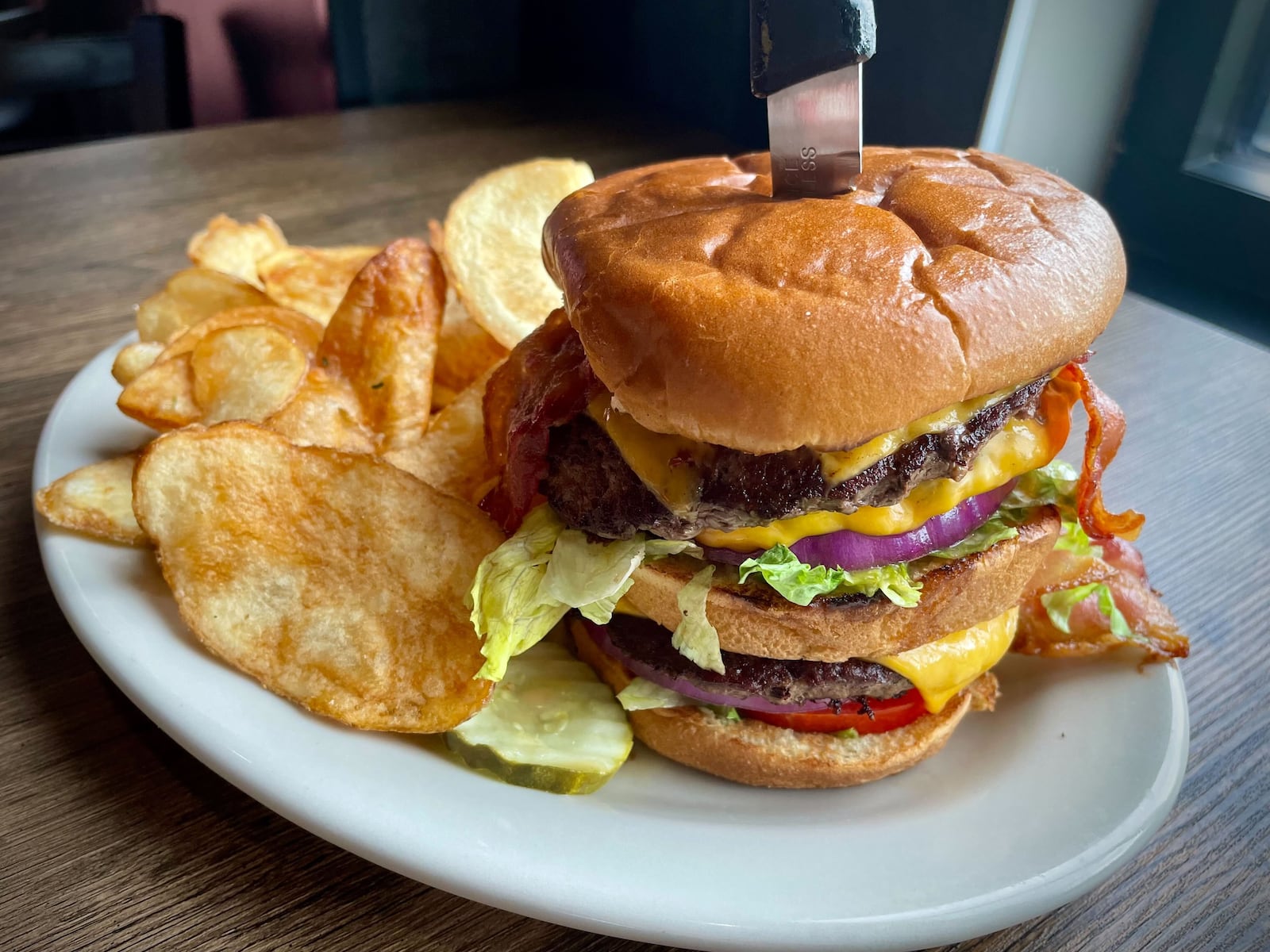 Butterbee’s American Grille, a family friendly, sports-themed restaurant and bar, is open in Xenia next door to Skyline Chili on Progress Drive. NATALIE JONES/STAFF