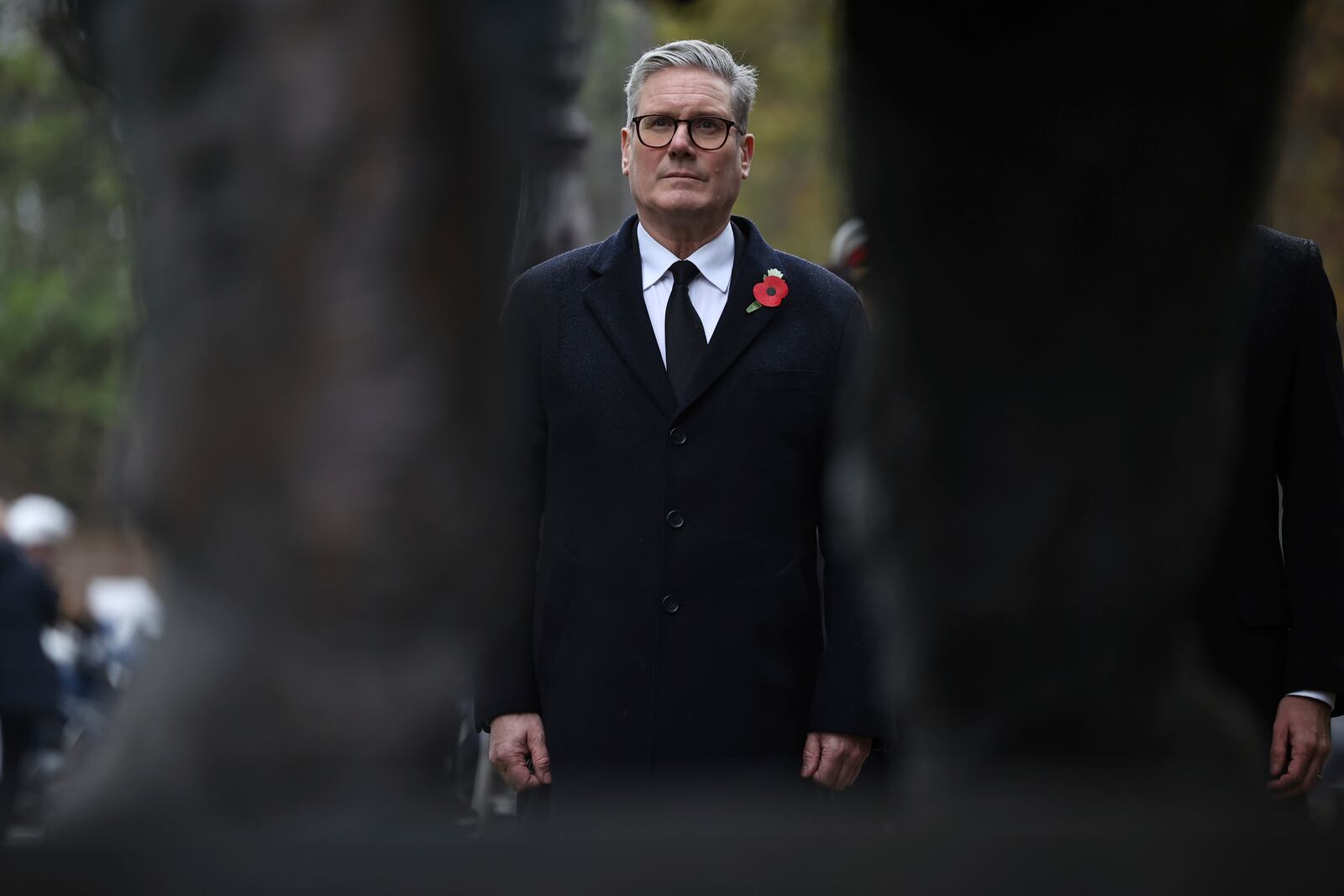 British Prime Minister Keir Starmer attends a ceremony in front of the statue of Winston Churchill near the Champs Elysees avenue, during commemorations marking the 106th anniversary of the WWI Armistice, in Paris, France, Monday, Nov.11 2024. (Christophe Petit Tesson, Pool via AP)