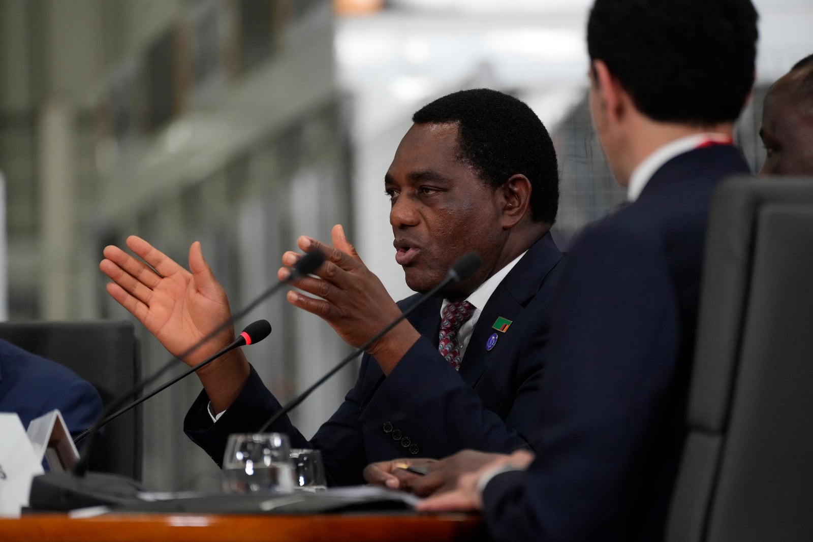 Zambia President Hakainde Hichilema speaks during the Lobito Corridor Trans-Africa Summit at the Carrinho food processing factory near Lobito, Angola, on Wednesday, Dec. 4, 2024. (AP Photo/Ben Curtis)