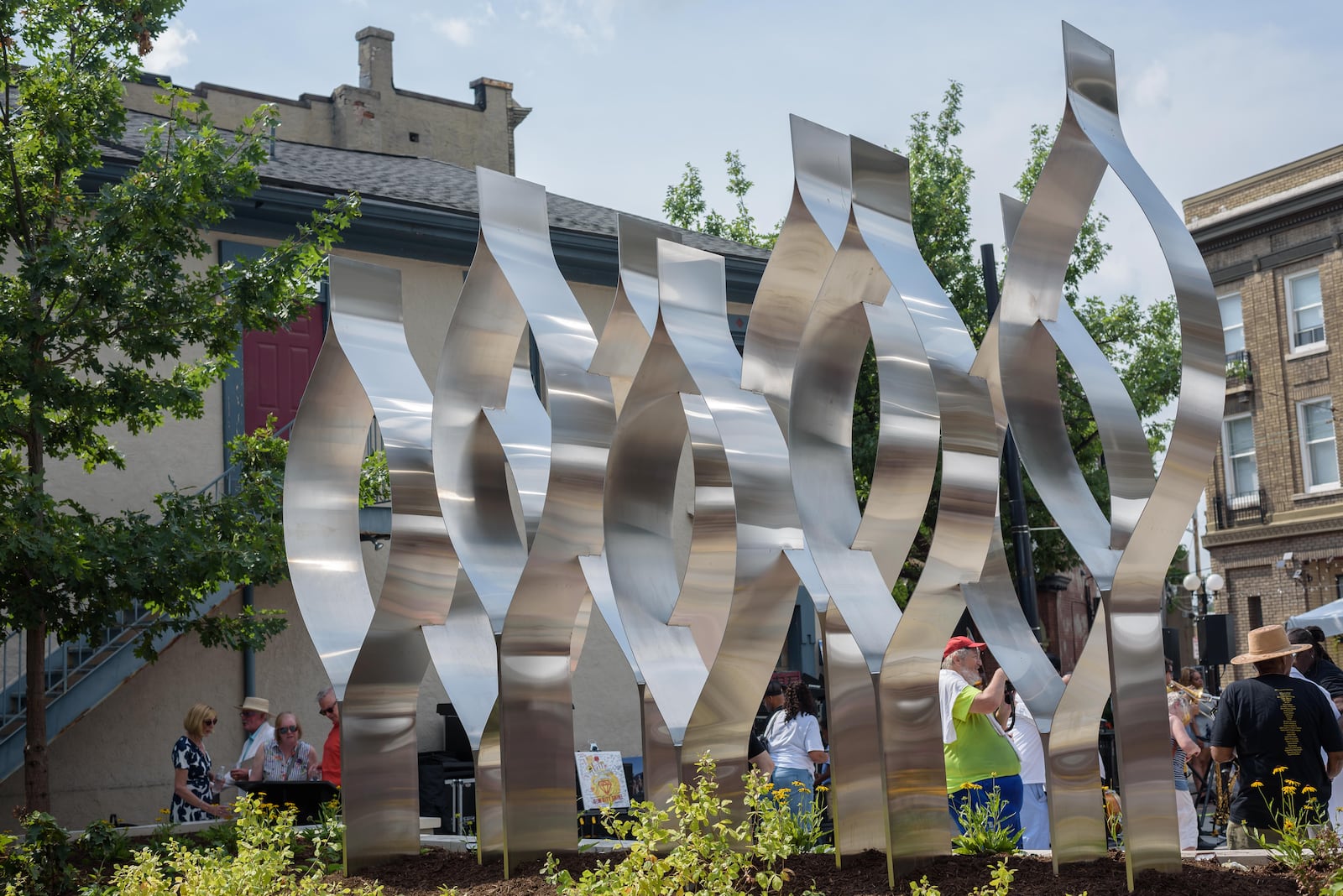 The Seed of Life Memorial, located at 530 E. Fifth St. in Dayton was unveiled on Aug. 4, 2024, five years after the mass shooting that left nine people dead and more than two dozen injured in Dayton's Oregon District. TOM GILLIAM / CONTRIBUTING PHOTOGRAPHER