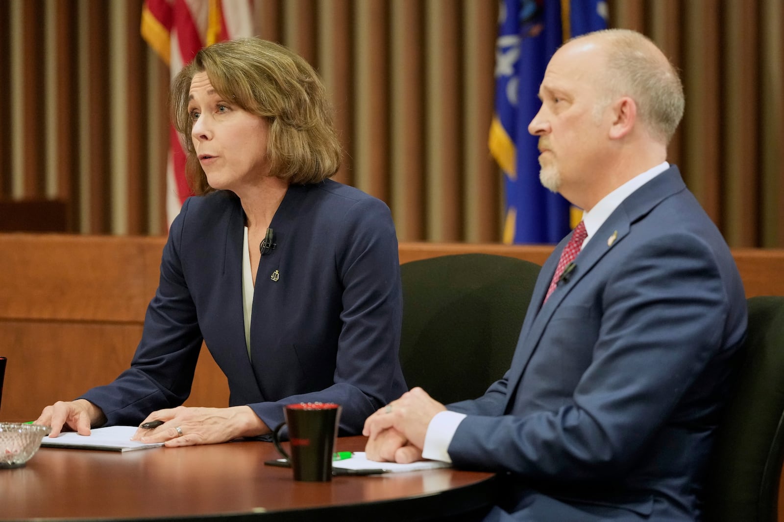 Wisconsin Supreme Court candidates Brad Schimel and Susan Crawford participate in a debate Wednesday, March 12, 2025, in Milwaukee. (AP Photo/Morry Gash)