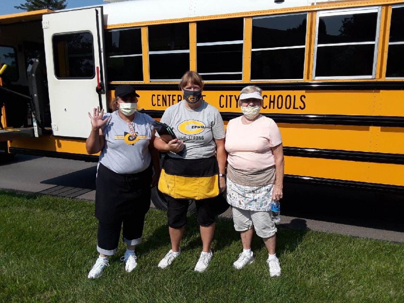 Staff for Centerville City Schools prepare to distribute food to students. CONTRIBUTED