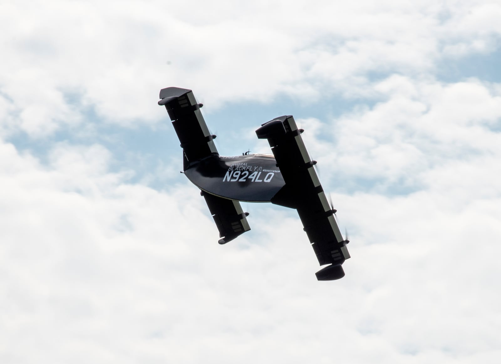 AFWERX, the Air Force’s innovation arm within the Air Force Research Laboratory, and Beavercreek-based defense contractor Modern Technology Solutions Inc. evaluate Pivotal’s BlackFly electric vertical take-off and landing aircraft at Springfield-Beckley Airport, Ohio, July 12, 2024.  (U.S. Air Force photo by Matthew Clouse).