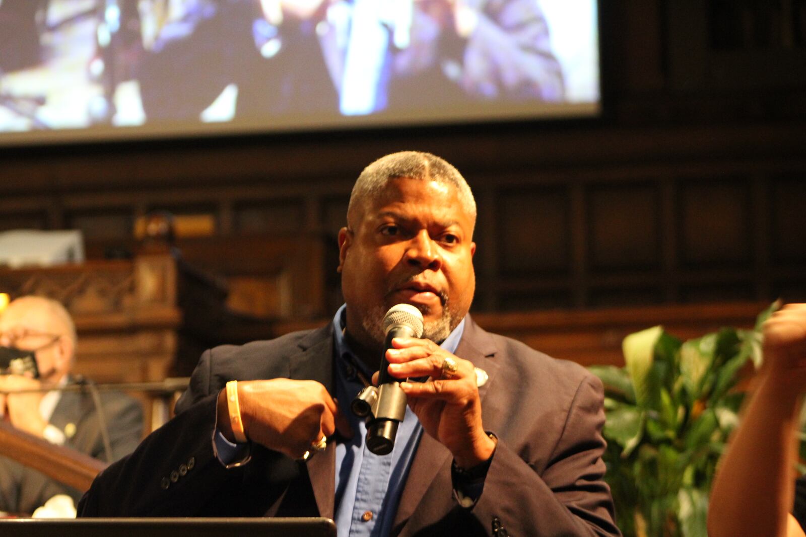 Derrick Foward, the president of the Dayton Unit NAACP, at a recent candidate forum. CORNELIUS FROLIK / STAFF