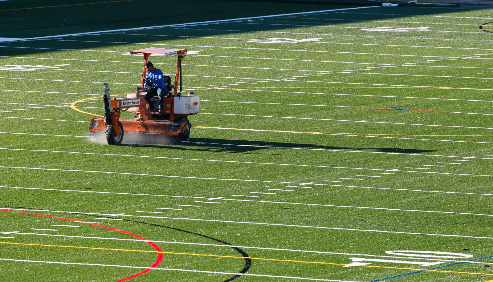 Crews work to install the turf playing field at Spooky Nook Sports Champion Mill Friday, Aug. 12, 2022 in Hamilton. NICK GRAHAM/STAFF