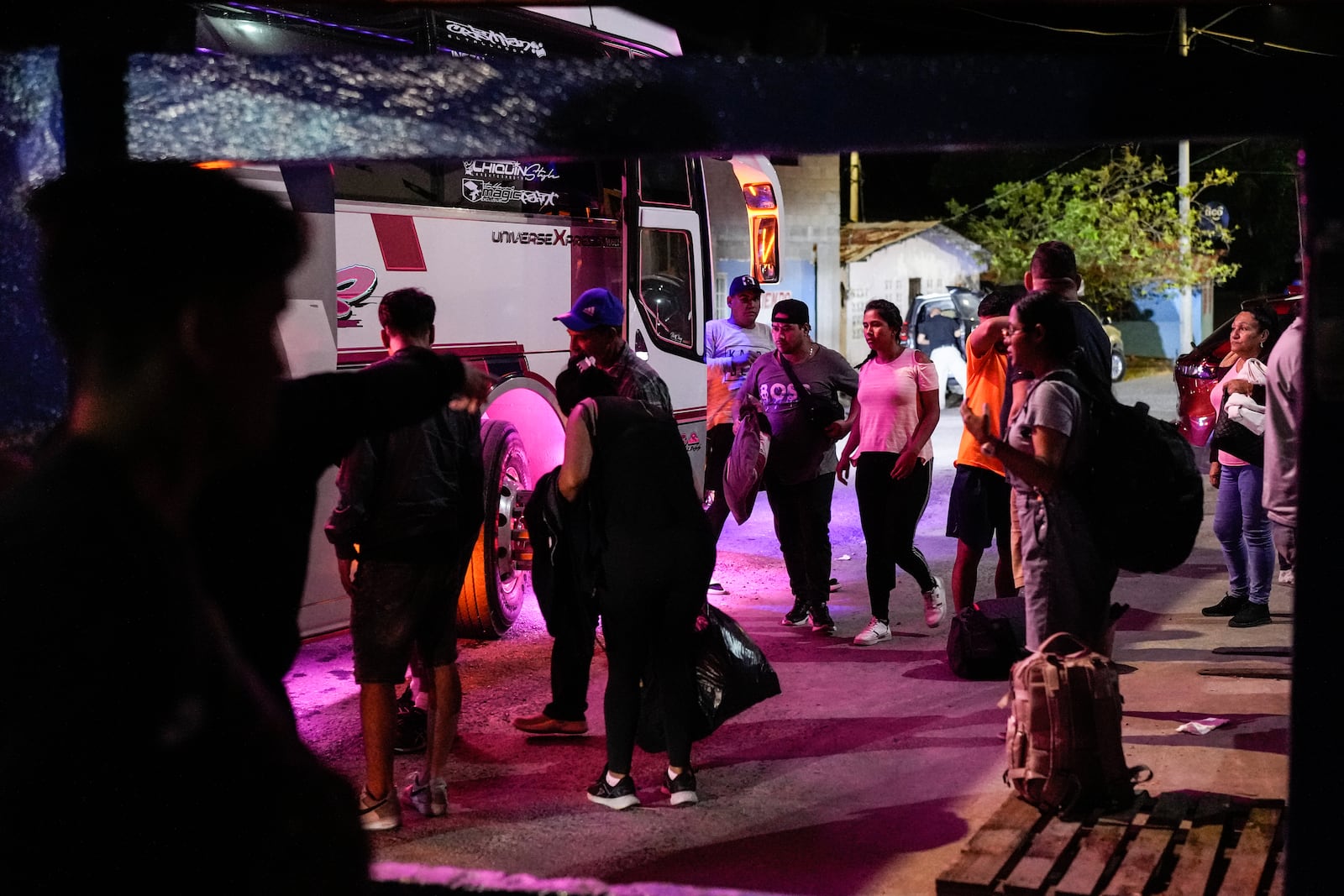 Migrants arrive at Miramar, Panama, Wednesday, Feb. 26, 2025. The migrants are returning from southern Mexico after giving up on reaching the U.S., a reverse flow triggered by the Trump administration's immigration crackdown. (AP Photo/Matias Delacroix)