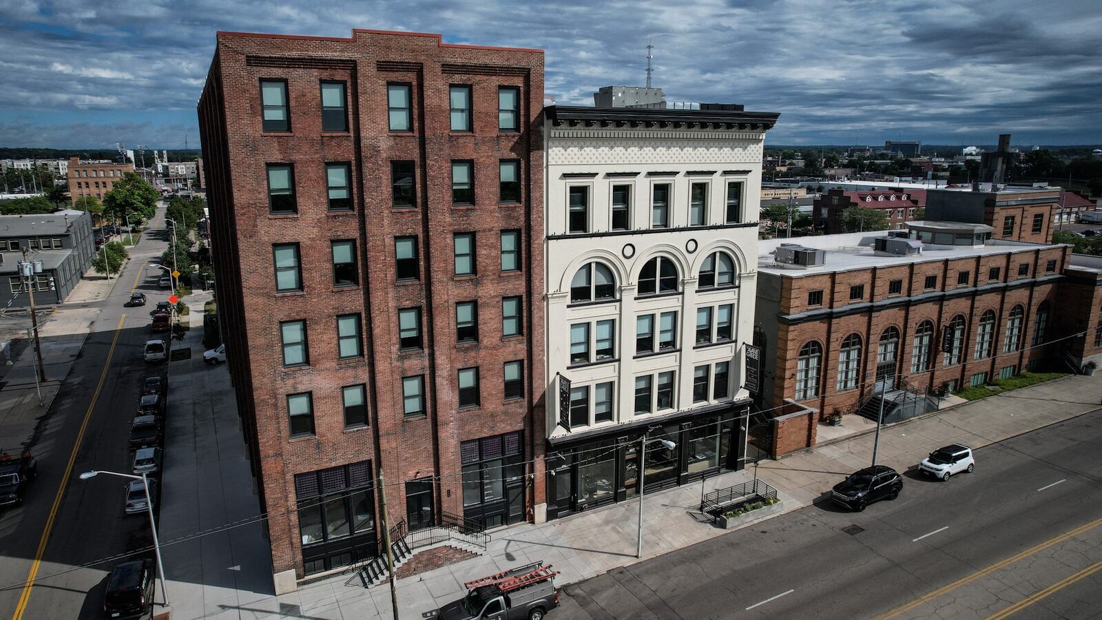 Mile Two was a pioneer in the 444 building down a block down Sears Street from its current home in the Manhattan building, which is the building to the left in his photo. The Avante Garde is on the right. JIM NOELKER/STAFF