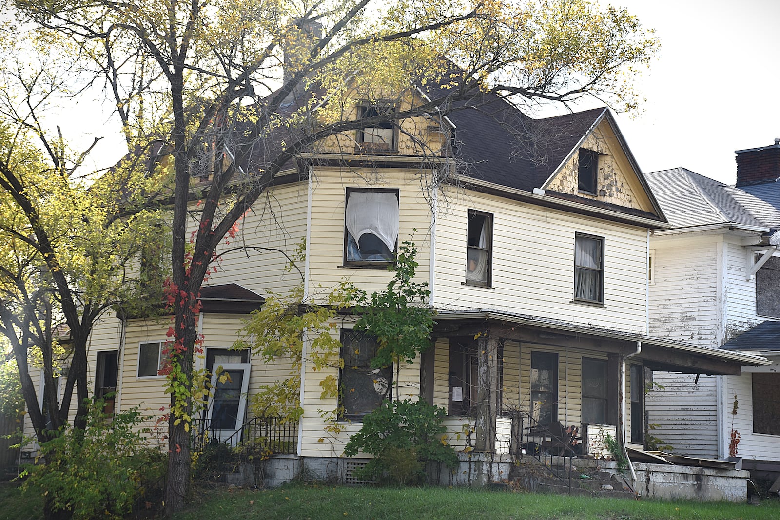 A home in West Dayton that is slated for demolition. CORNELIUS FROLIK / STAFF