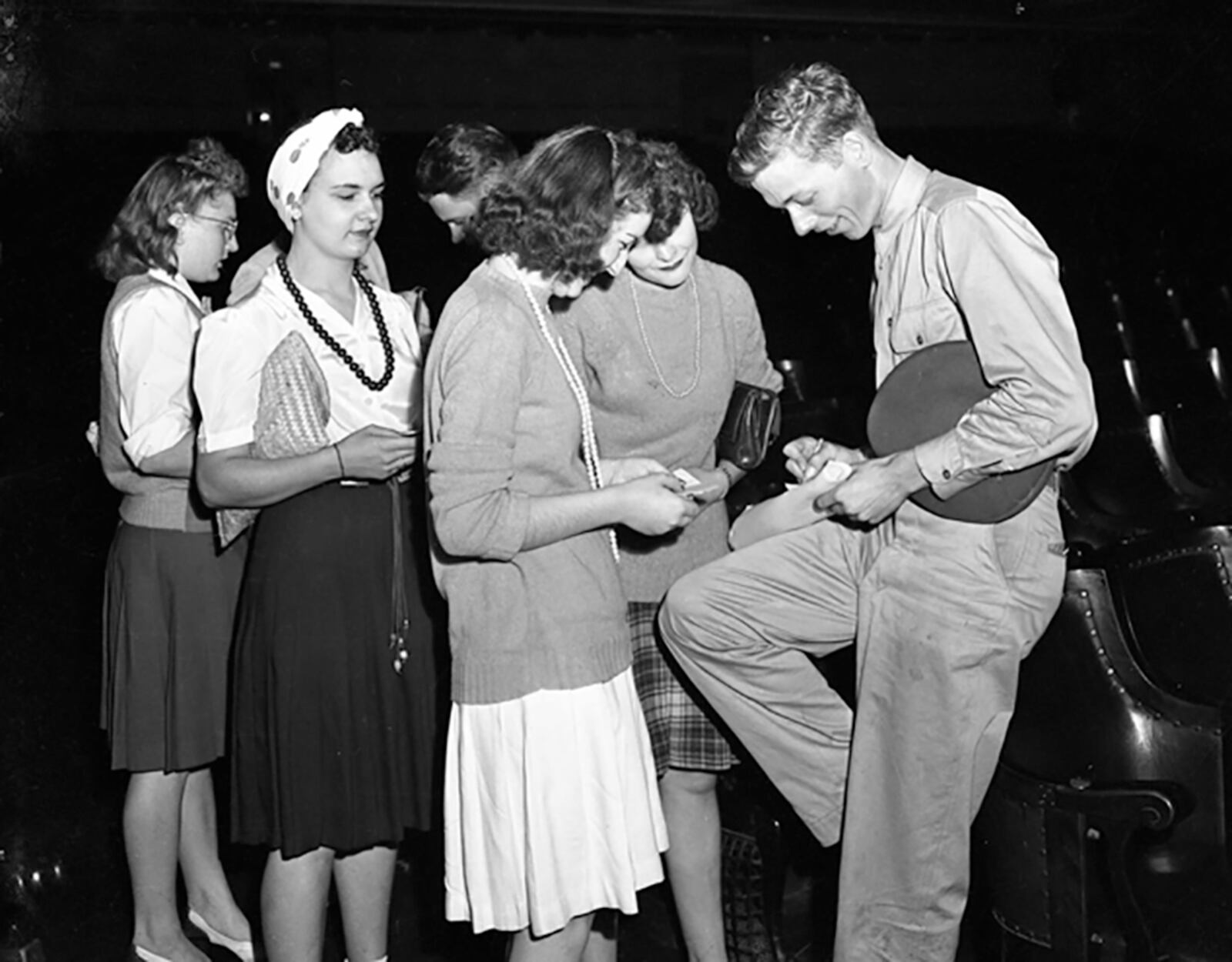 Crew members of the Memphis Belle signed autographs for workers at the National Cash Register factory during a visit to Dayton on a war bond tour.  NCR ARCHIVE AT CARILLON HISTORICAL PARK