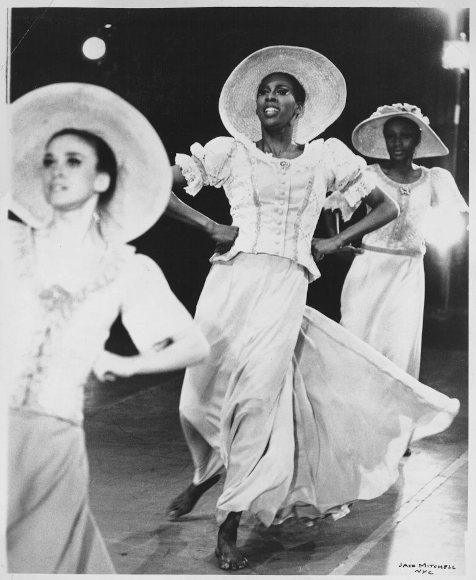 This undated photo provided by the Alvin Ailey Dance Foundation shows Judith Jamison, center, performing in Alvin Ailey's "Revelations." (Jack Mitchell/Alvin Ailey Dance Foundation and Smithsonian Institution via AP)