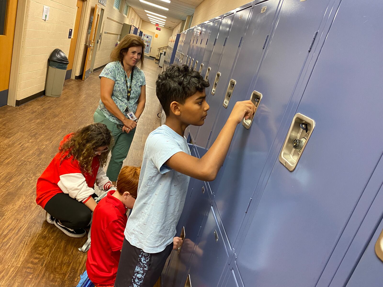 Students at Springboro Intermediate open lockers on the first day of school on Tuesday. Courtesy of Springboro Schools.