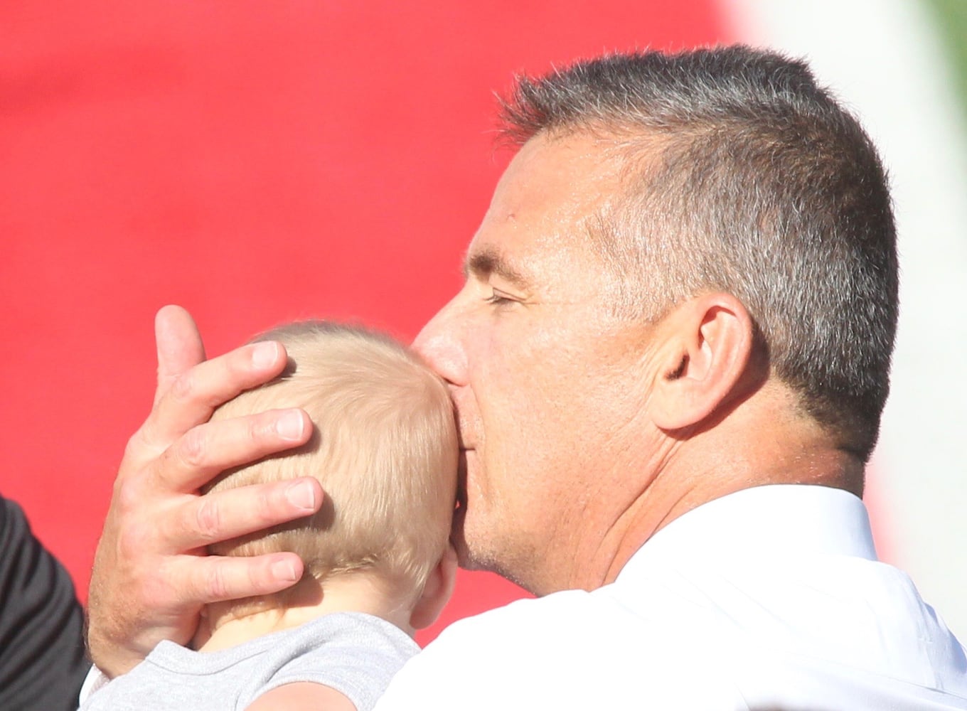 Photos: Urban Meyer jogs across field at Ohio Stadium