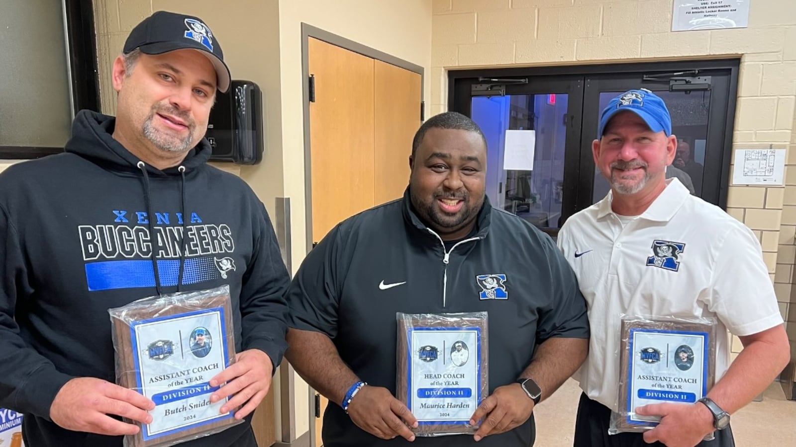 2024 Miami Valley Football Coaches Association coaches of the year from Xenia Butch Snider, Maurice Harden (center, head coach) and Tony Greer