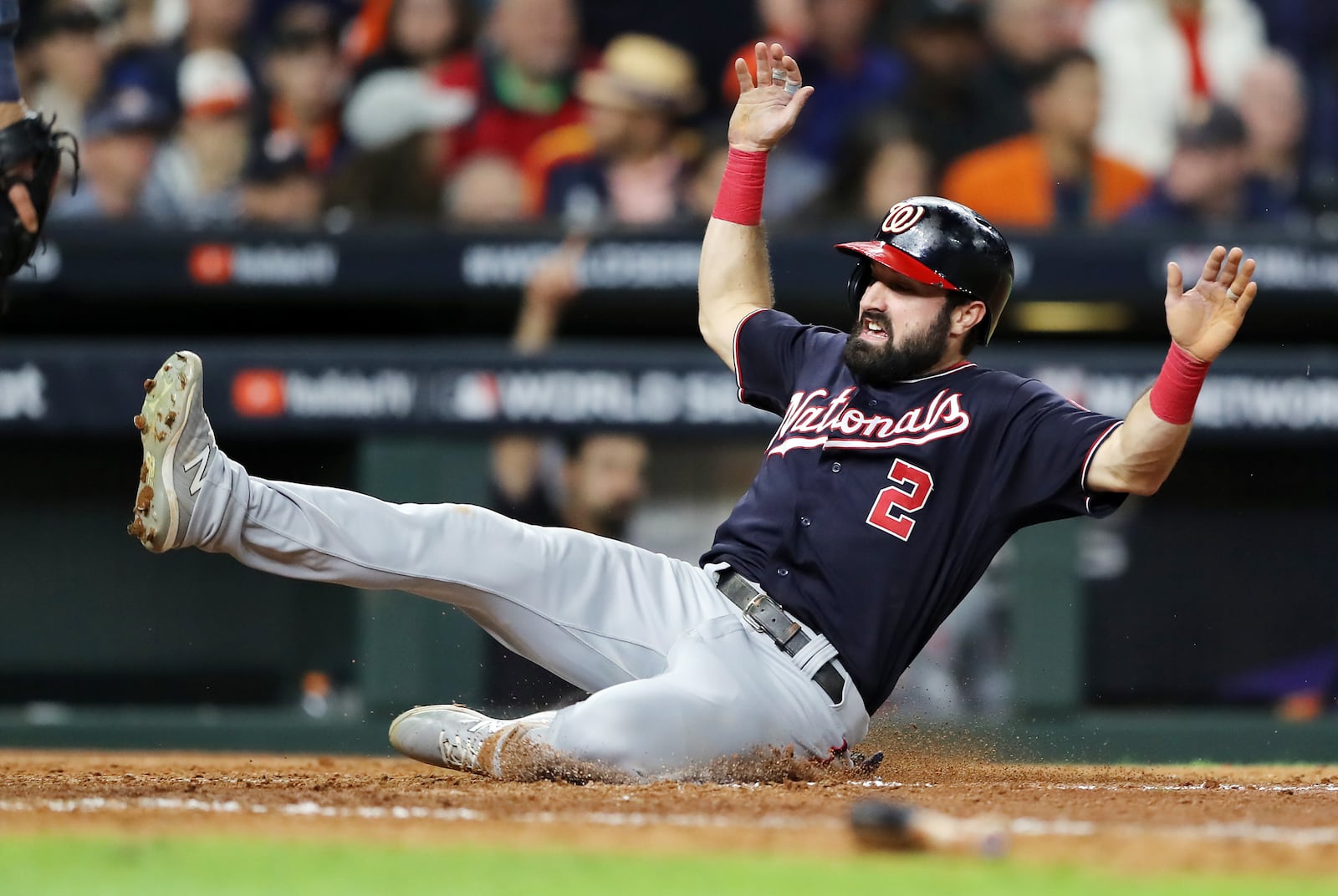 HOUSTON, TEXAS - OCTOBER 30:  Adam Eaton #2 of the Washington Nationals scores a run on a single by Juan Soto (not pictured) against the Houston Astros during the eighth inning in Game Seven of the 2019 World Series at Minute Maid Park on October 30, 2019 in Houston, Texas. (Photo by Elsa/Getty Images)