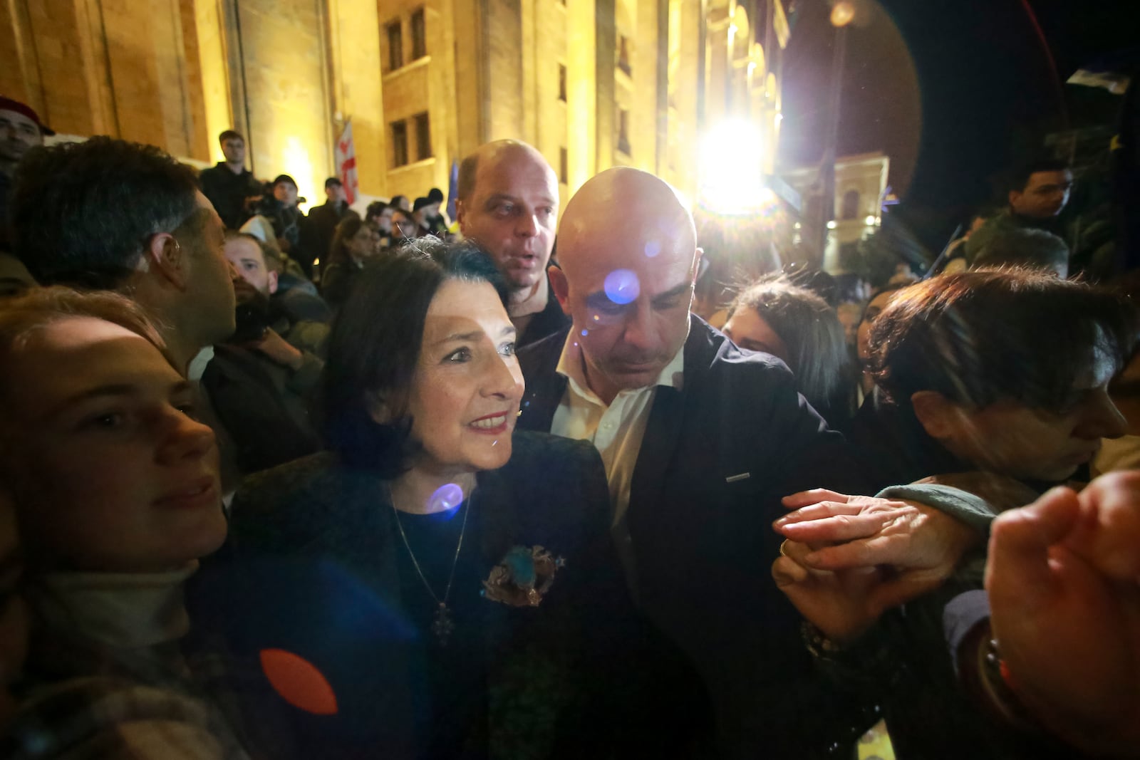 FILE - Georgian President Salome Zourabichvili, center, is greeted by well-wishers as she attends an opposition protest against the results of the parliamentary election in Tbilisi, Georgia, on Oct. 28, 2024. (AP Photo/Zurab Tsertsvadze, File)