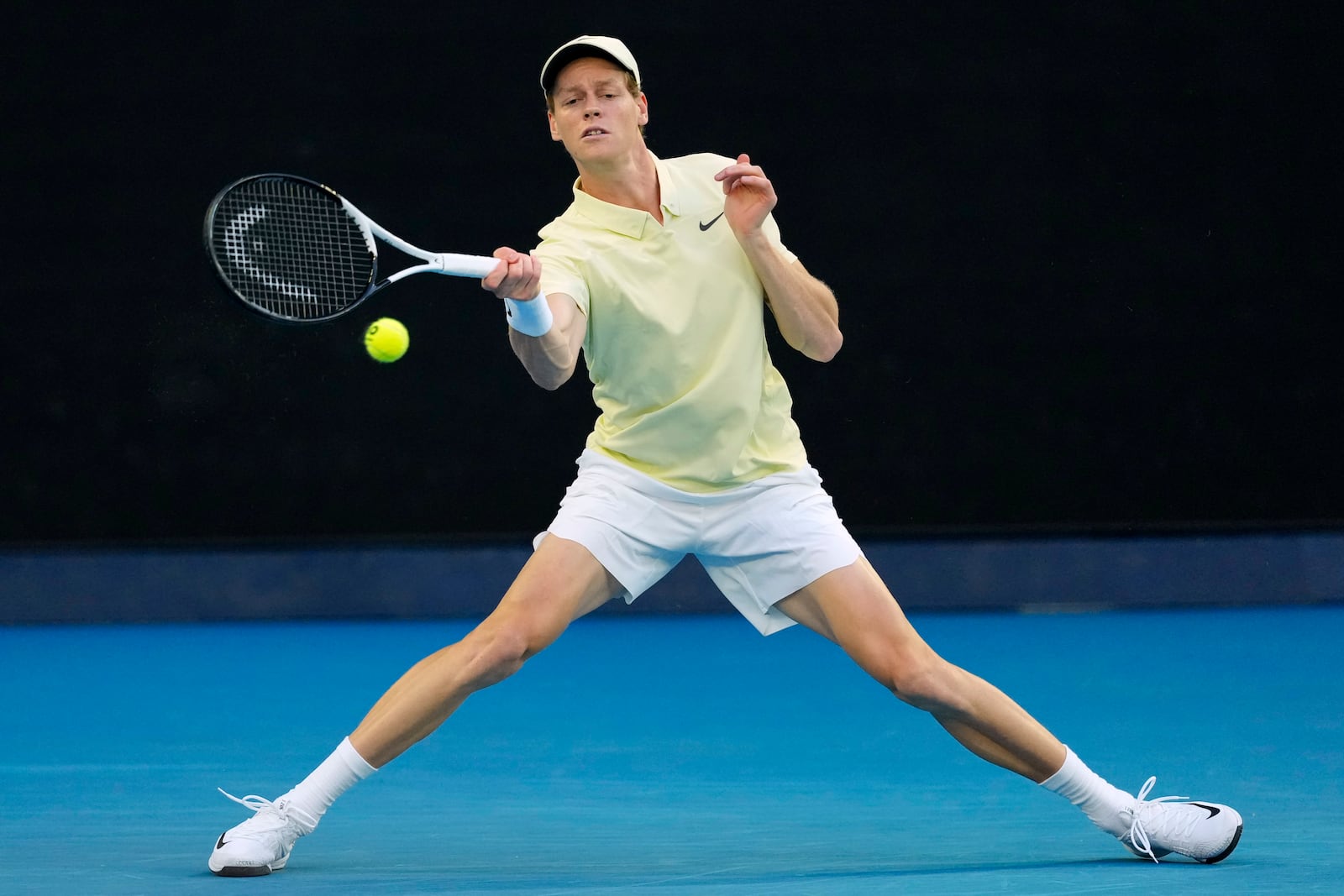 Jannik Sinner of Italy plays a forehand return to Alexander Zverev of Germany during the men's singles final at the Australian Open tennis championship in Melbourne, Australia, Sunday, Jan. 26, 2025. (AP Photo/Asanka Brendon Ratnayake)