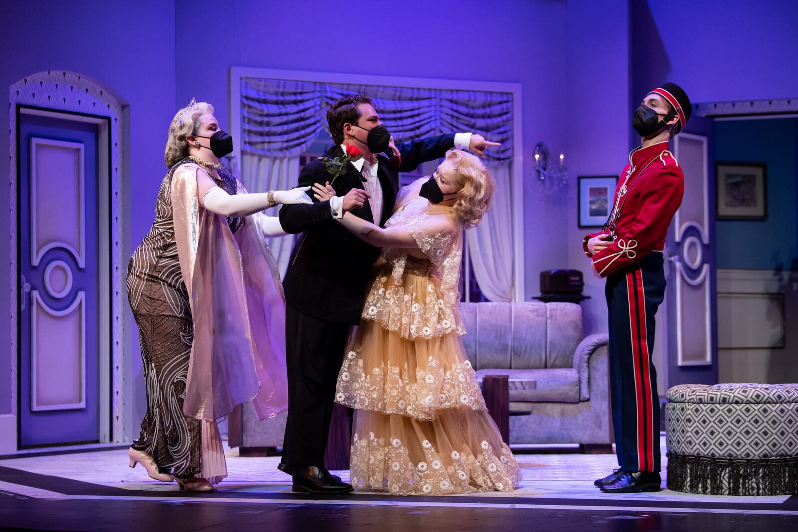 (left to right) Sam Evans (Julia), Jacob Jones (Saunders), Camille Carmichael (Maggie), and Tommy Cole (Bellhop) in Wright State University's production of "Lend Me a Tenor."