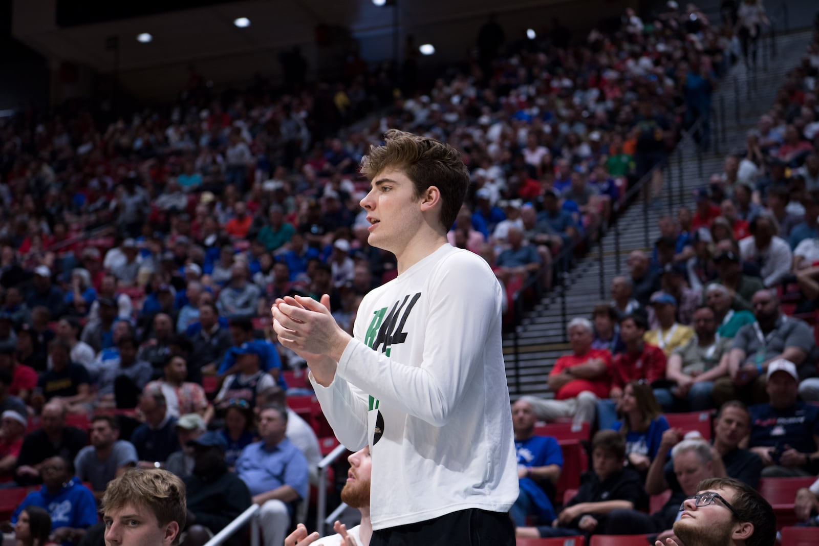 Alex Huibregtse cheers on his Wright State teammates during last year's NCAA Tournament game vs. Arizona in San Diego. Joe Craven/Wright State Athletics