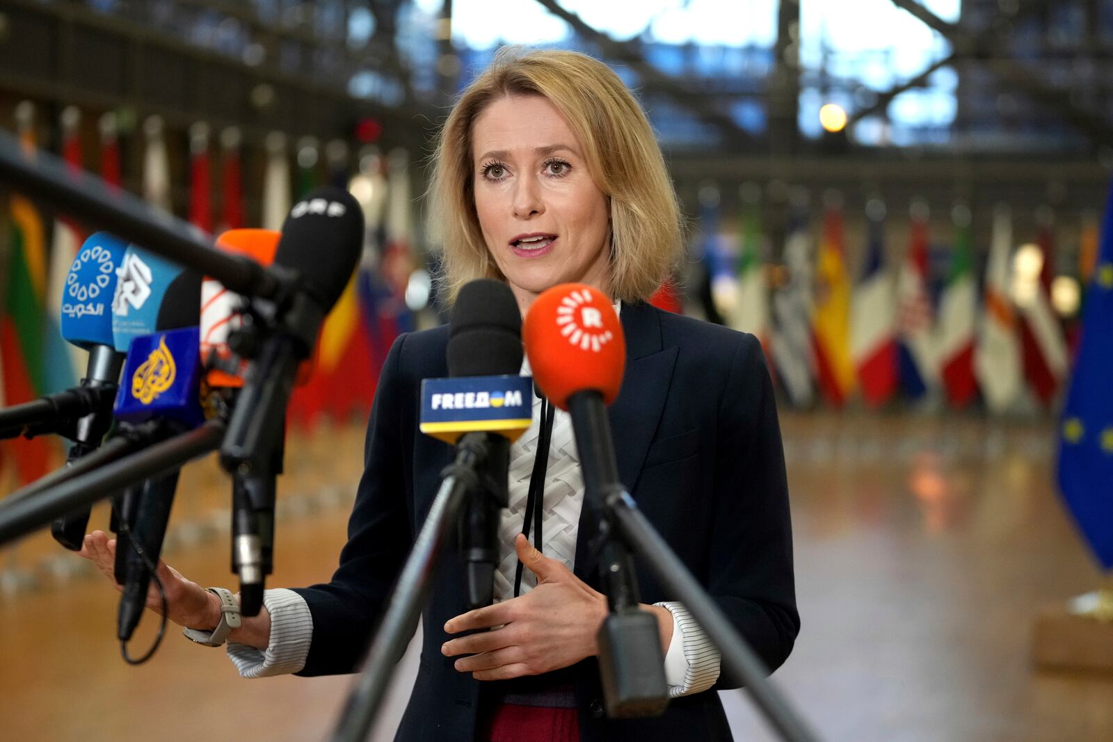 European Union foreign policy chief Kaja Kallas speaks with the media as she arrives for a meeting of EU foreign ministers at the European Council building in Brussels, Monday, Jan. 27, 2025. (AP Photo/Virginia Mayo)