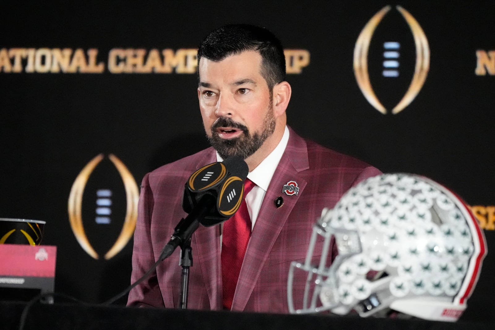 Ohio State head coach Ryan Day speaks during a news conference ahead of the College Football Playoff national championship game Sunday, Jan. 19, 2025, in Atlanta. The game between Ohio State and Notre Dame will be played on Monday. (AP Photo/Chris Carlson)