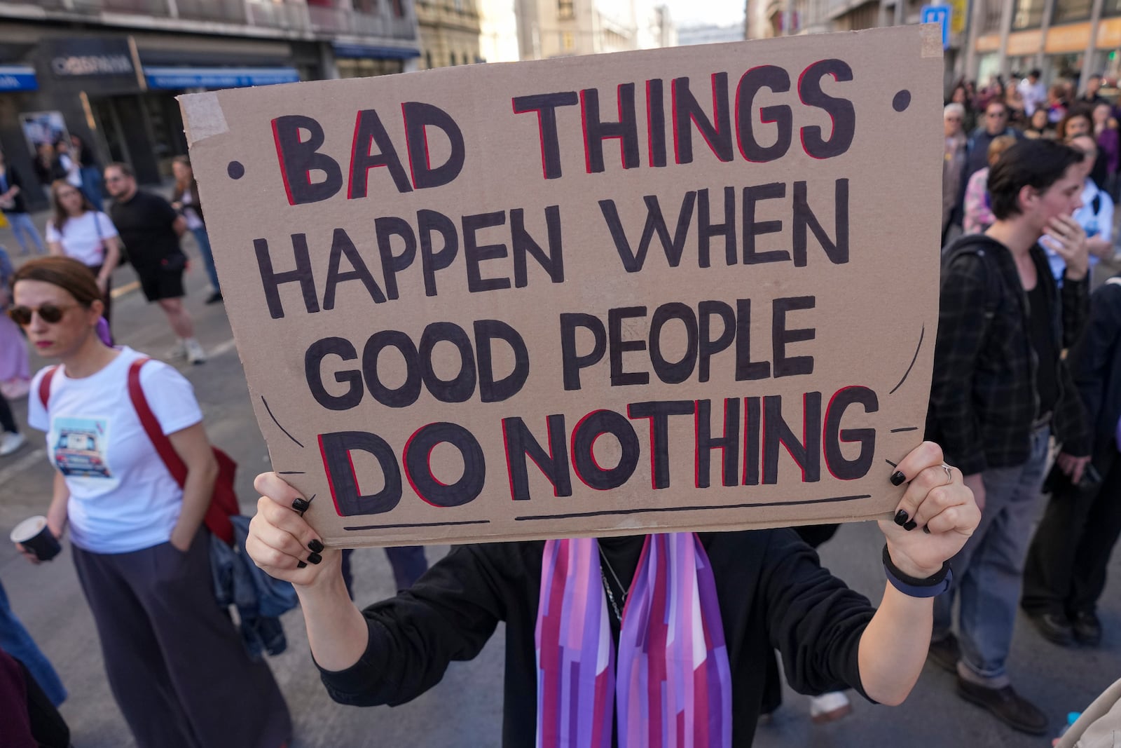 People march in support of women on the International Women's Day in Belgrade, Serbia, Saturday, March 8, 2025. (AP Photo/Darko Vojinovic)