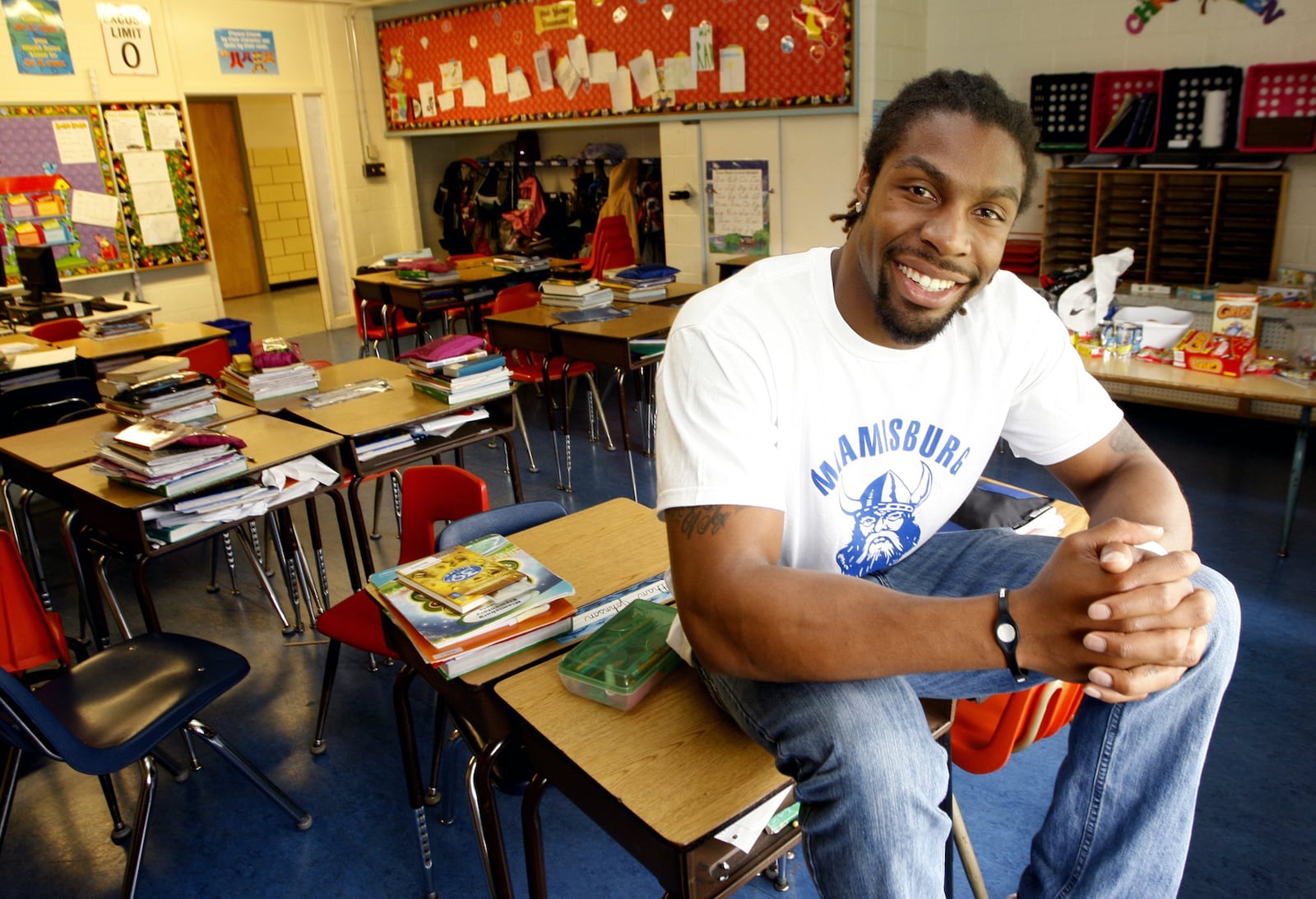 *** SPECIAL TO THE DENVER POST *** Denver Broncos safety David Bruton poses inside a classroom where he is substitute teacher at Mound Elementary School, Thursday, May 19, 2011, in Miamisburg, Ohio. (AP Photo/David Kohl)