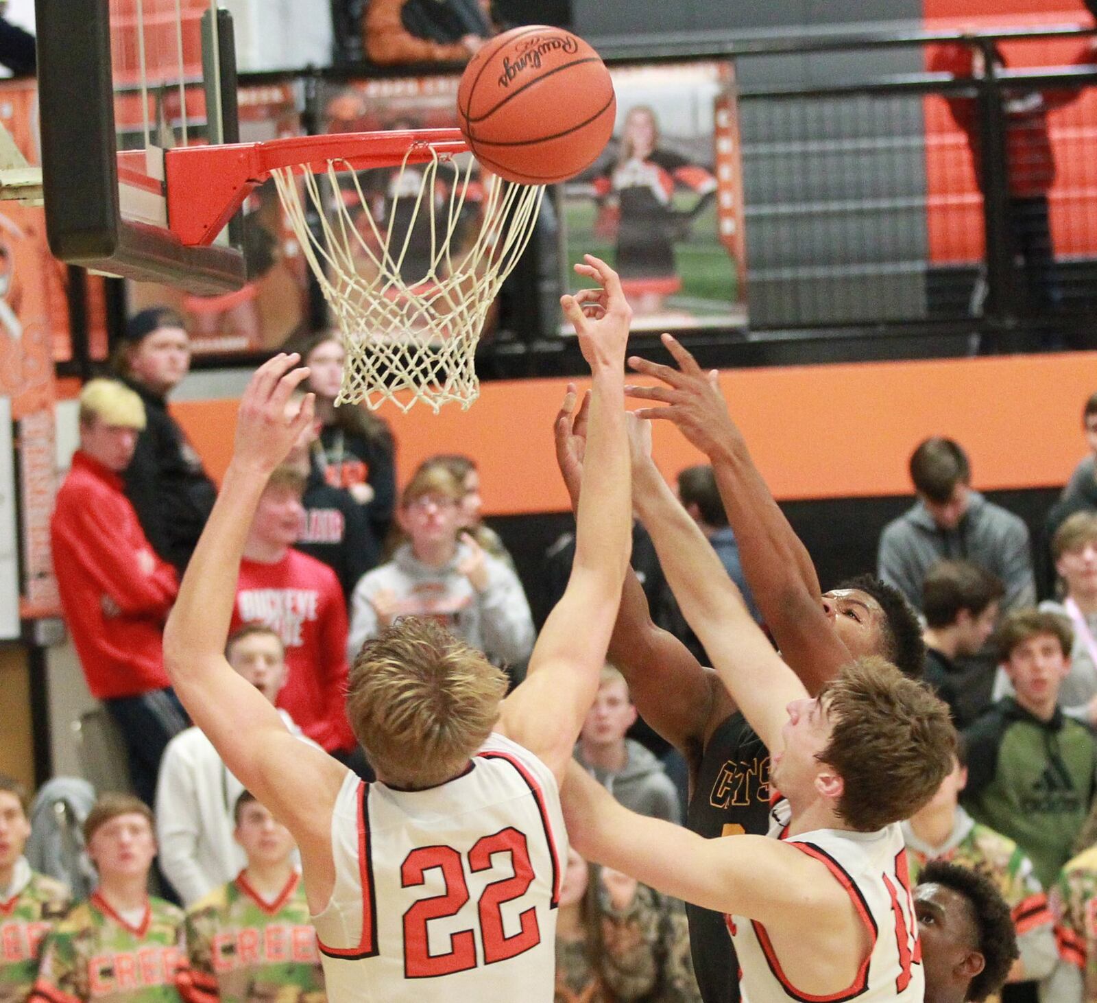 Adam Duvall of Beavercreek (22) battles for a rebound. Beavercreek defeated visiting Springfield 54-48 in a GWOC boys high school basketball game on Tuesday, Dec. 17, 2019. MARC PENDLETON / STAFF