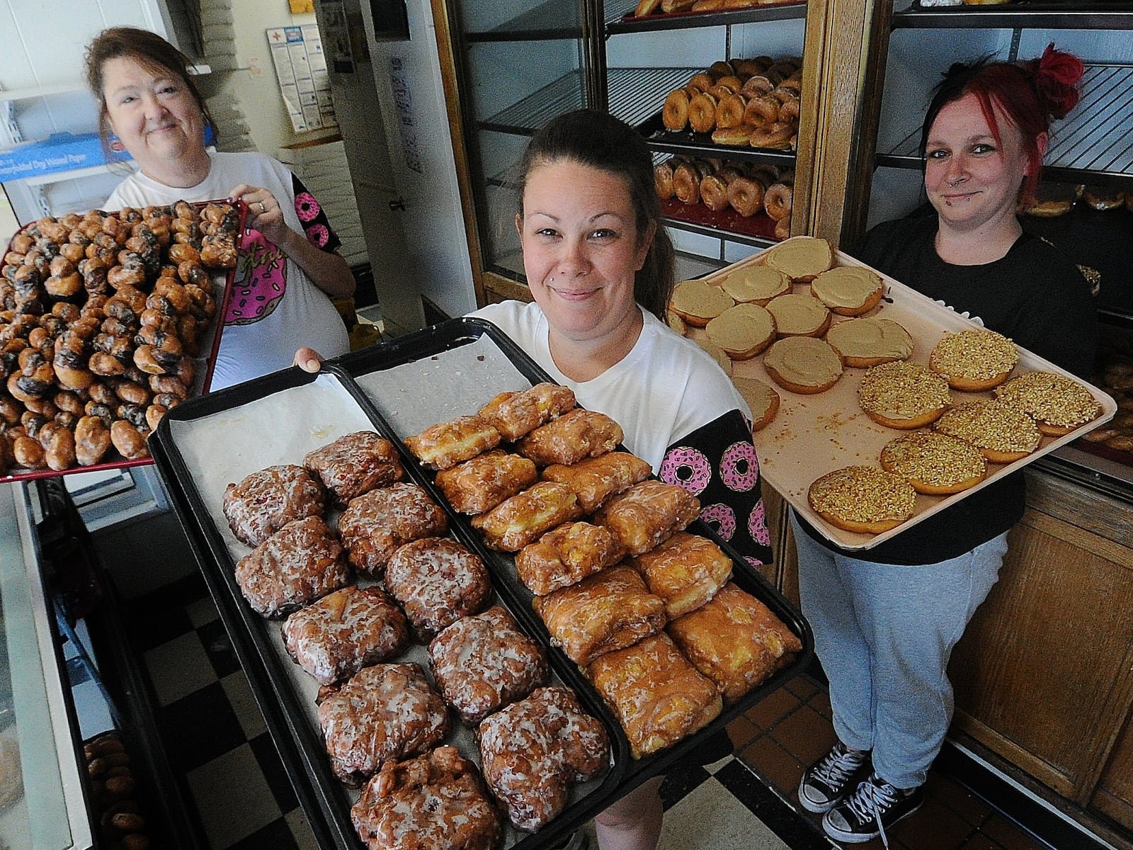 Stan the Donut Man is preparing for National Donut Day on Friday, June 7. Pictured (left to right) is Gretchen Crain, Lindsey Roberts and Ashley Cooper. MARSHALL GORBY\STAFF