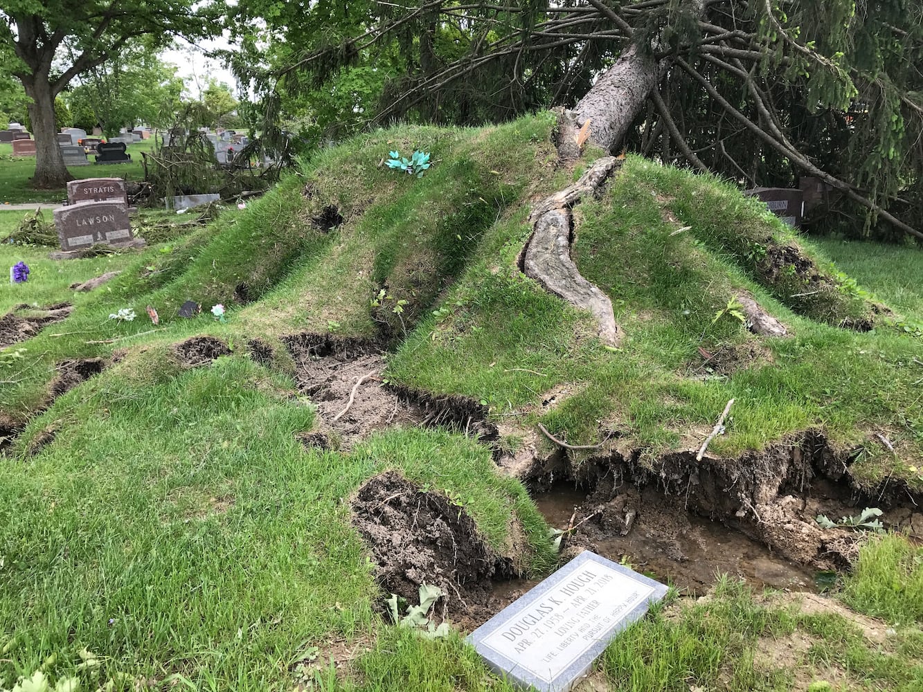 PHOTOS: Tornado-damaged communities dig out, clean up