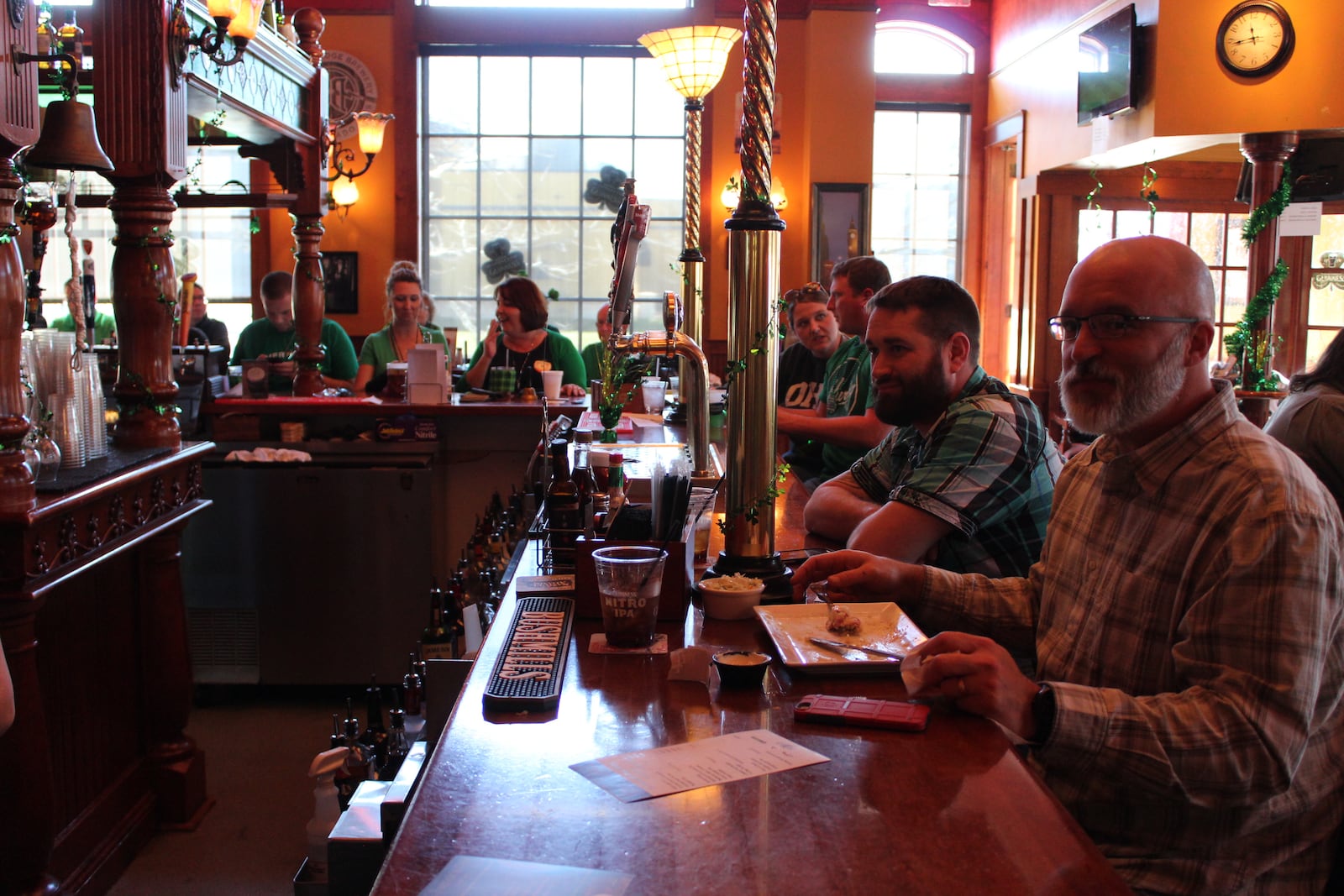 The usually bustling lunchtime traffic at the Greene in Beavercreek was all directed toward one establishment on St. Patrick's Day 2016: The British-themed Pub, 390 Greene Blvd. VIVIENNE MACHI / STAFF