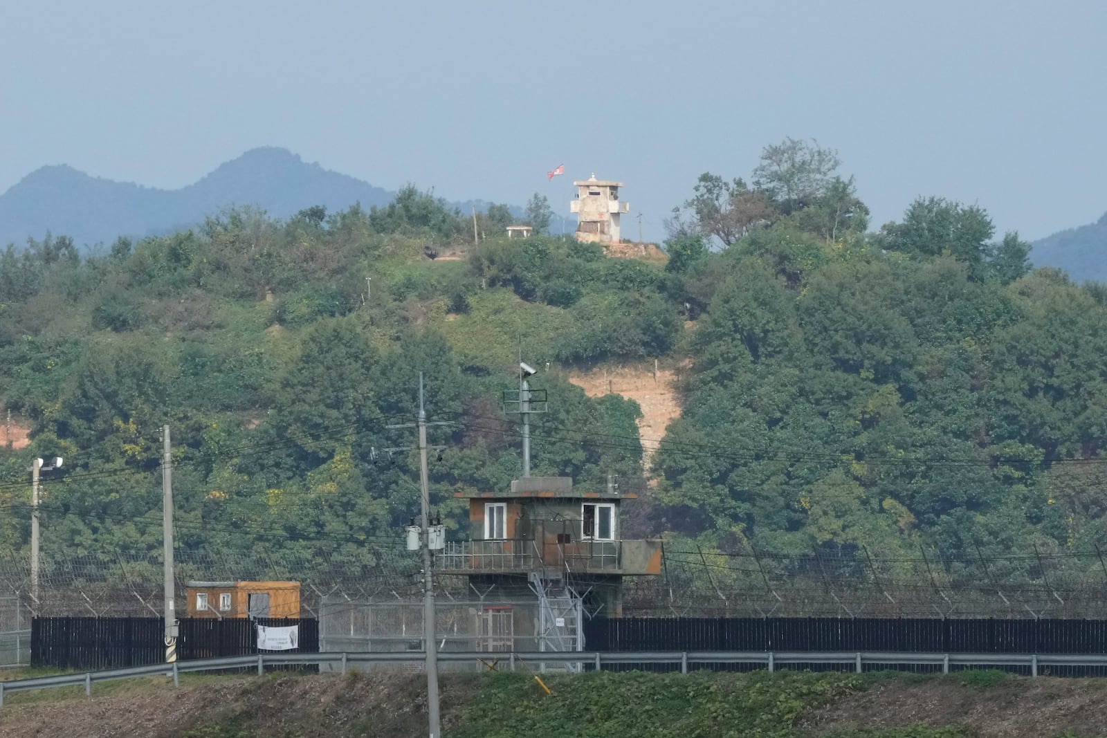 FILE - A North Korean military guard post, top, and a South Korean post, bottom, are seen from Paju, South Korea, near the border with North Korea, Thursday, Oct. 10, 2024. (AP Photo/Ahn Young-joon, File)