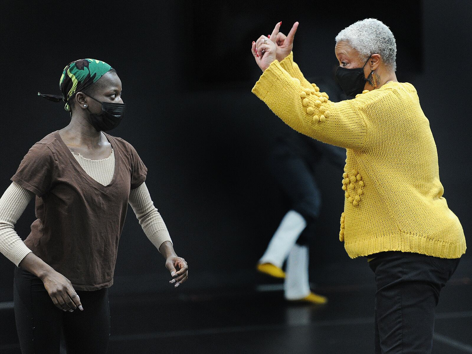 DCDC Artistic Director Debbie Blunden-Diggs works with the company dancers Thursday Feb. 10, 2022. MARSHALL GORBY\STAFF