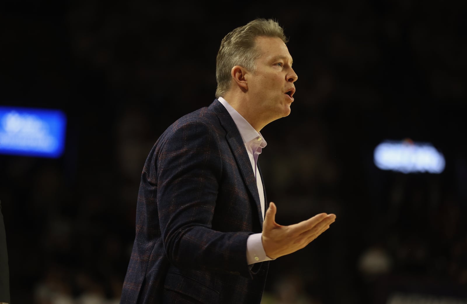 Richmond's Chris Mooney coaches during a game against Dayton on Saturday, Jan. 27, 2024, at the Robins Center in Richmond, Va. David Jablonski/Staff