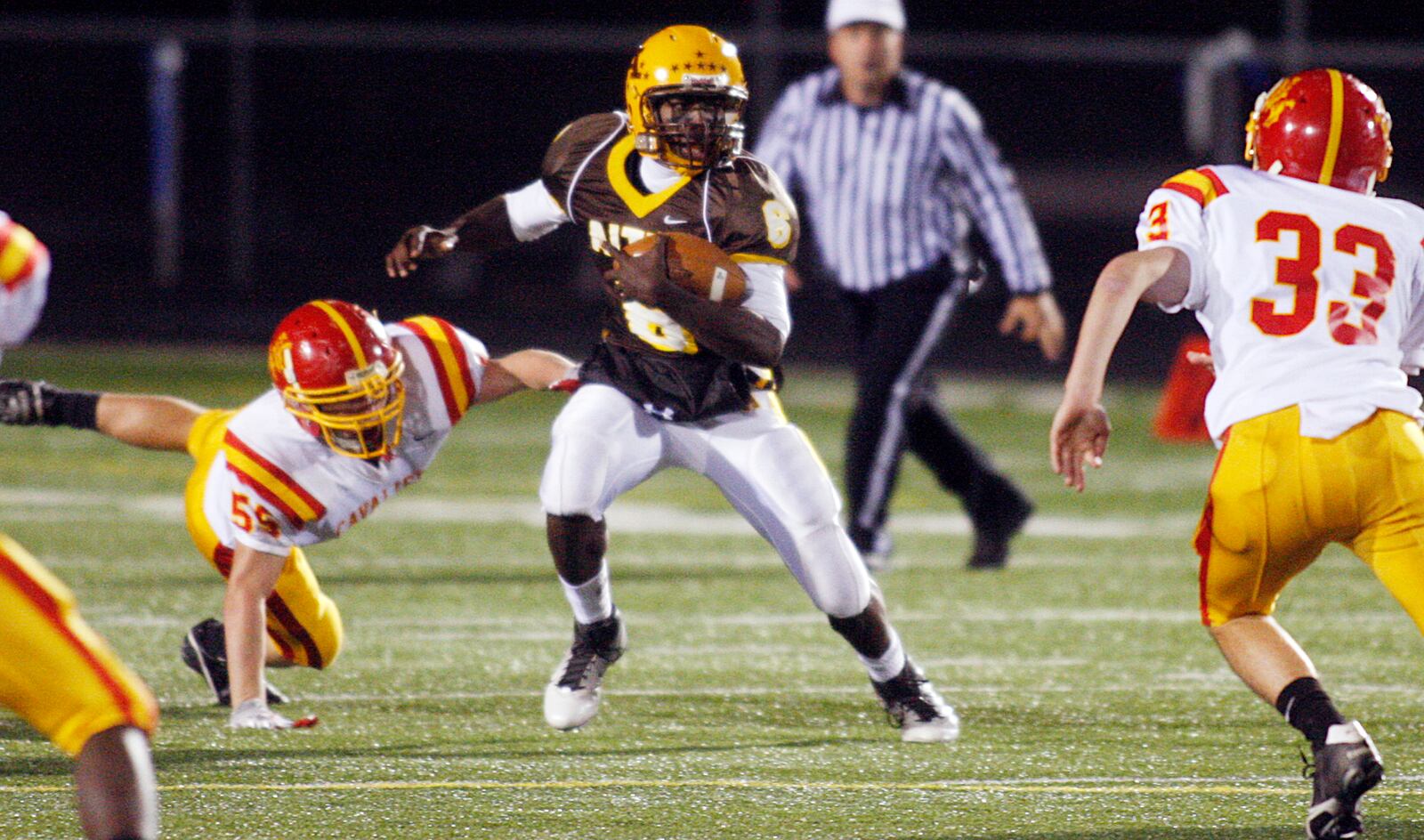 Alter's Malik Zaire gains yards on Purcell Marian at Springboro High School on Thursday, Sept. 15, 2011. Teesha McClam/Dayton Daily News