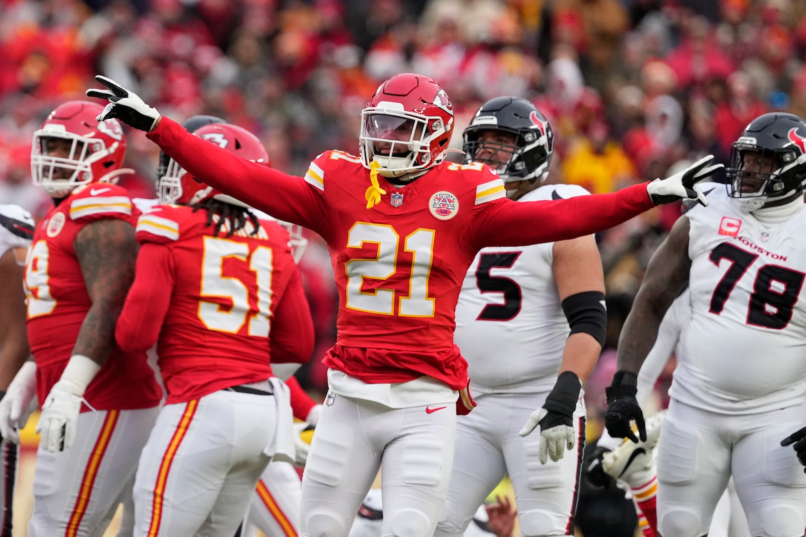 Kansas City Chiefs defensive back Jaden Hicks (21) reacts to a missed field goal attempt by Houston Texans kicker Ka'imi Fairbairn during the first half of an NFL football AFC divisional playoff game Saturday, Jan. 18, 2025, in Kansas City, Mo. (AP Photo/Ed Zurga)