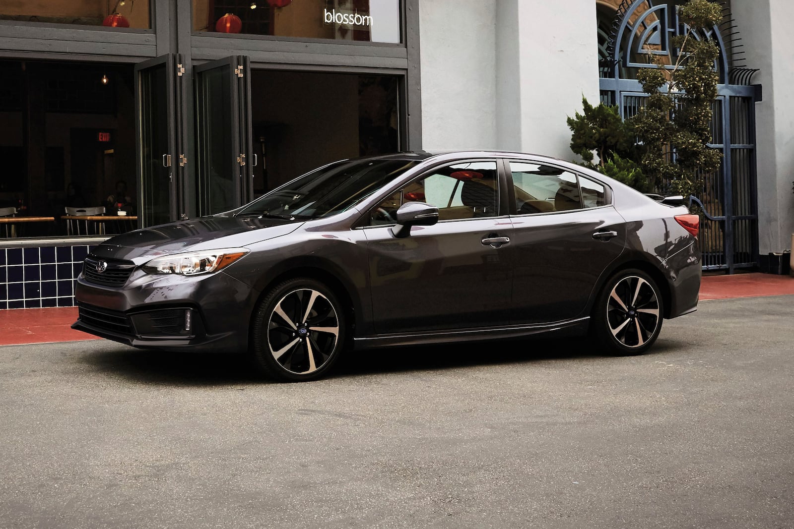 This photo provided by Subaru shows the 2022 Subaru Impreza, which is available used with all-wheel drive for less than $25,000. Its combination of all-wheel drive and priced-right utility makes it great for winter driving. (Courtesy of Subaru of America via AP)