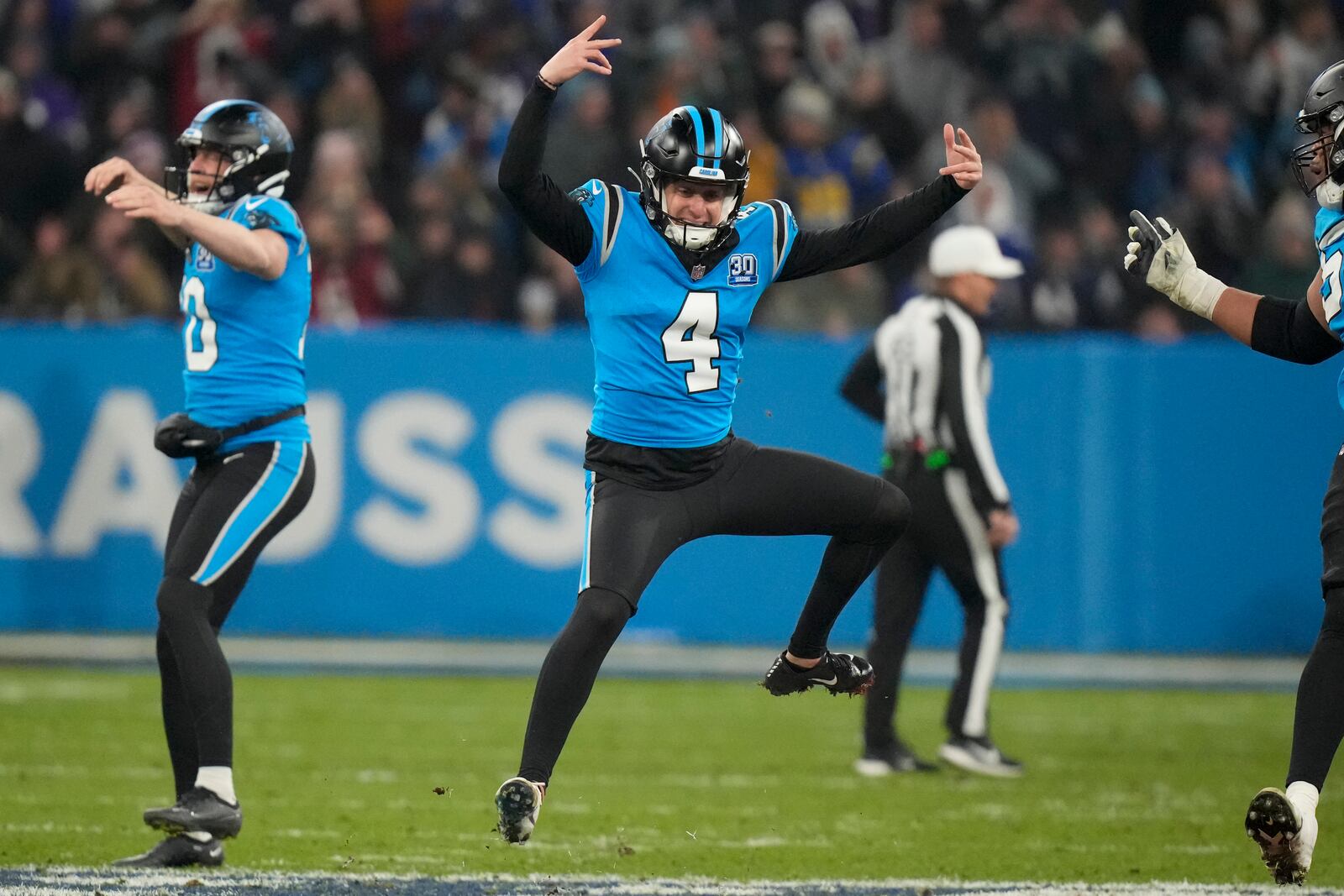 Carolina Panthers kicker Eddy Pineiro celebrates after kicking the game-winning field goal in overtime against New York Giants during an NFL football game, Sunday, Nov. 10, 2024, in Munich, Germany. (AP Photo/Matthias Schrader)